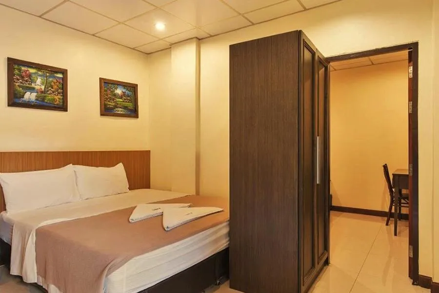 Bed in Lodge 61 Hotel