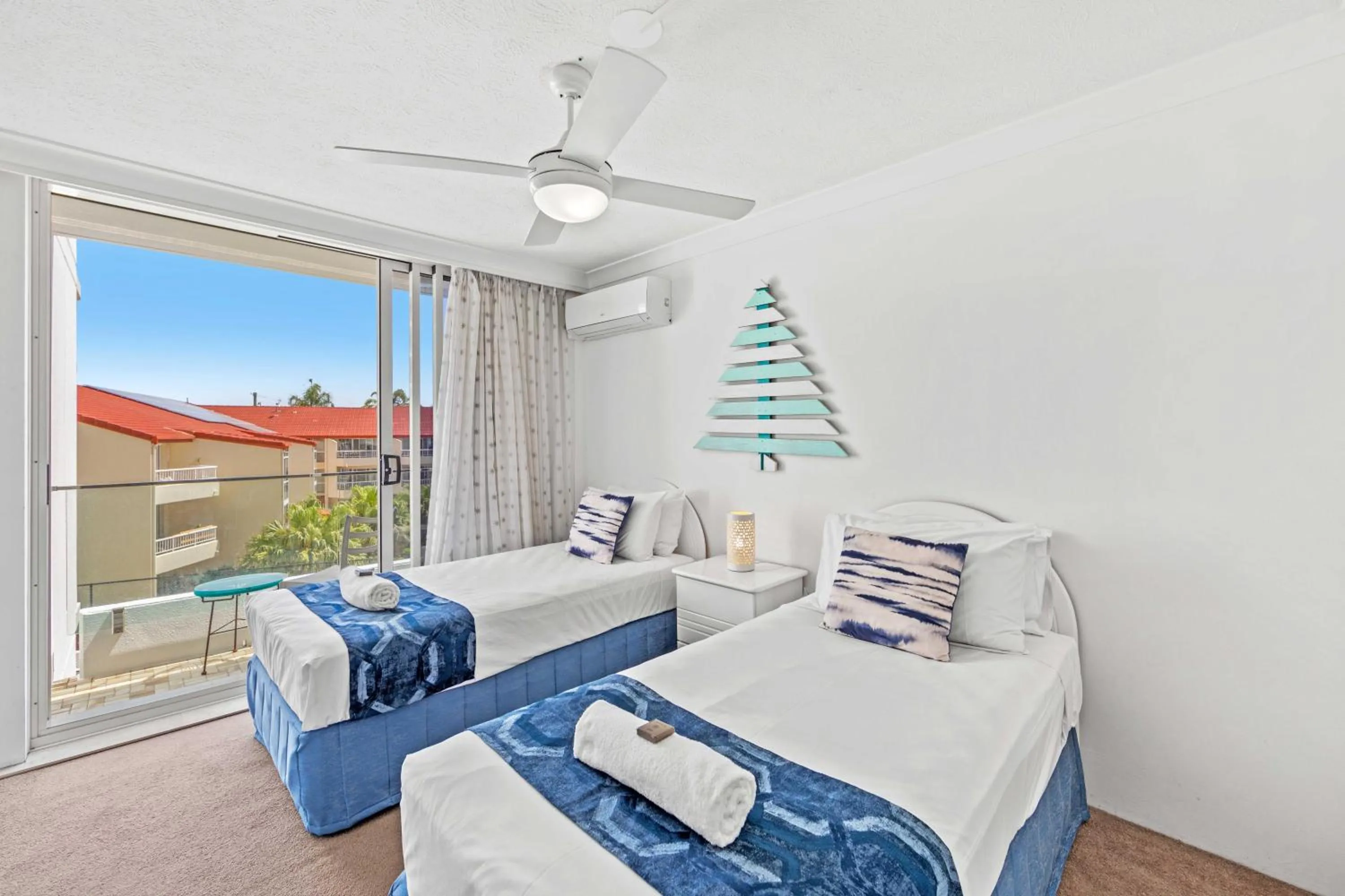 Bed in Southern Cross Beachfront Holiday Apartments