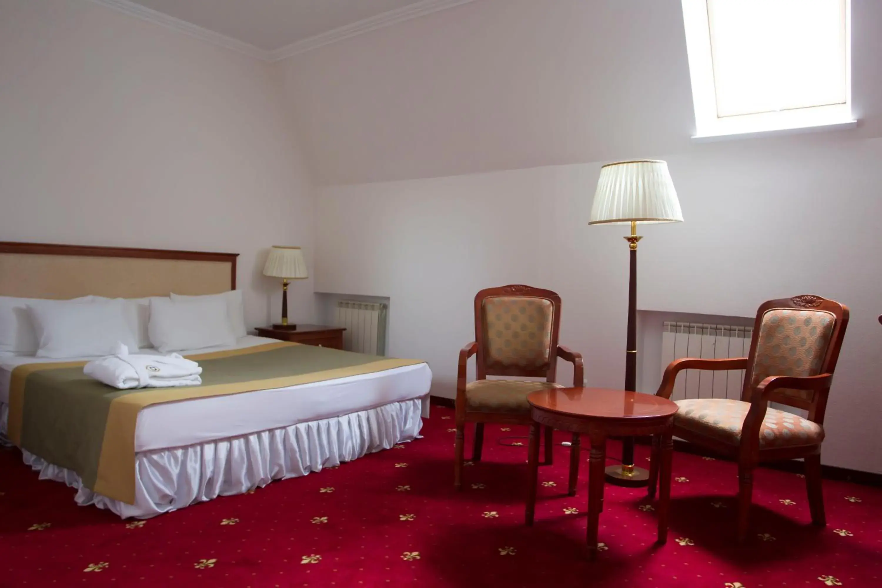 Decorative detail, Bed in Atyrau Dastan Hotel Decorative detail, Bed in Atyrau Dastan Hotel