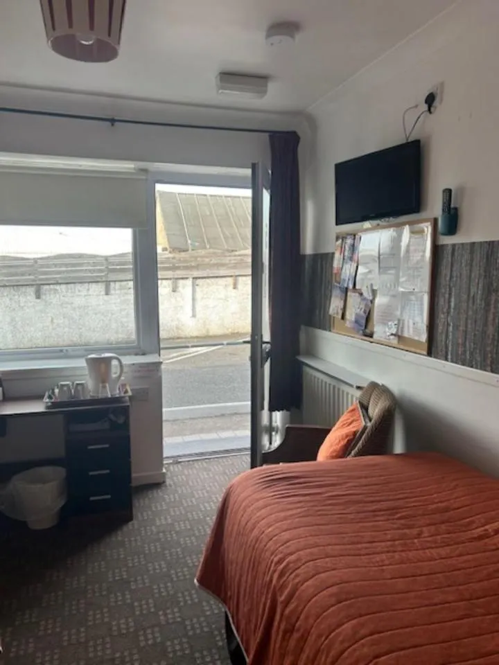 Photo of the whole room, Bed in The Thistle