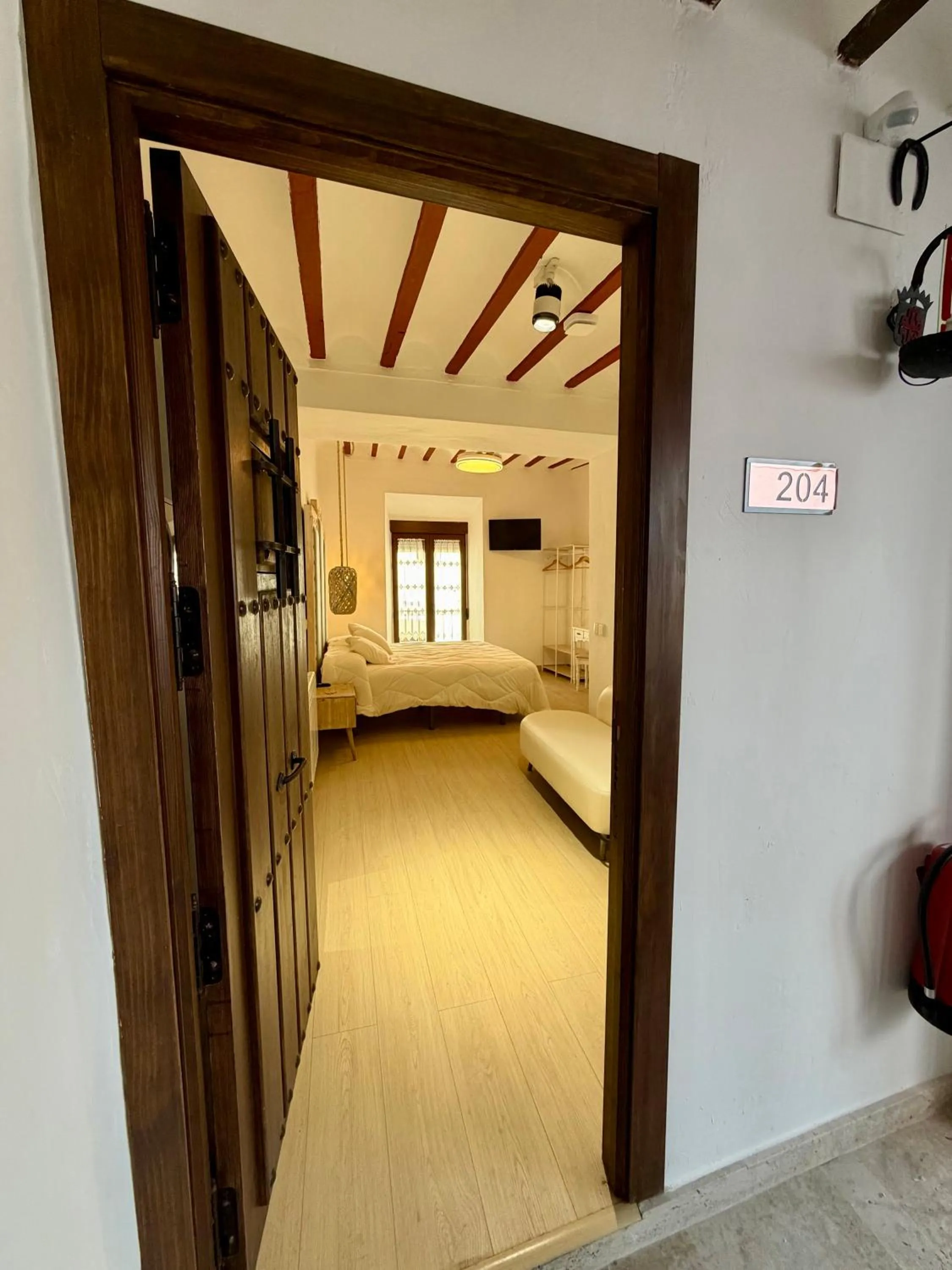 Bed in RETIRO DEL TEATRO Hotel Boutique y Apartamentos en Almagro