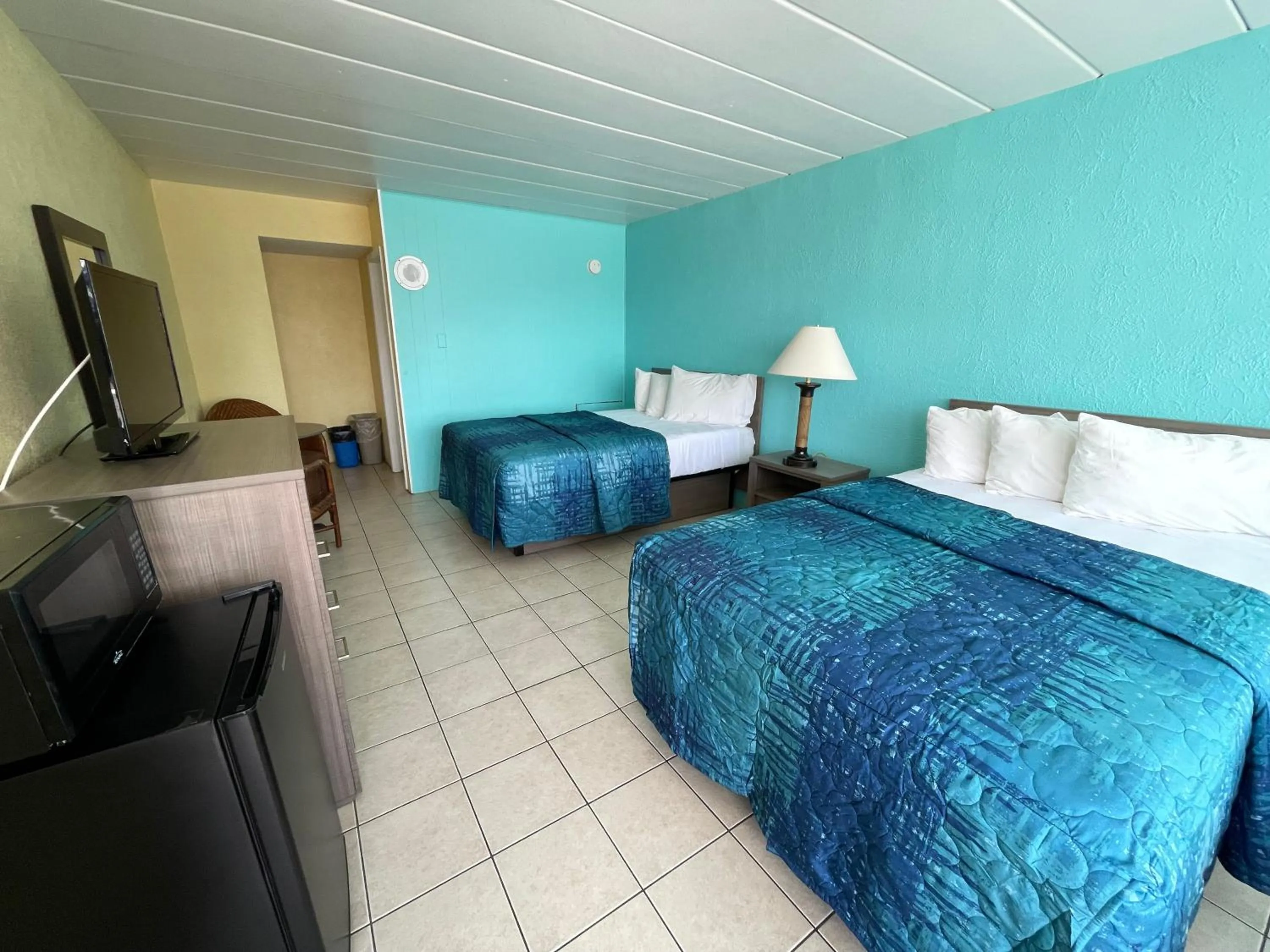 Bed in Bird of Paradise Motel