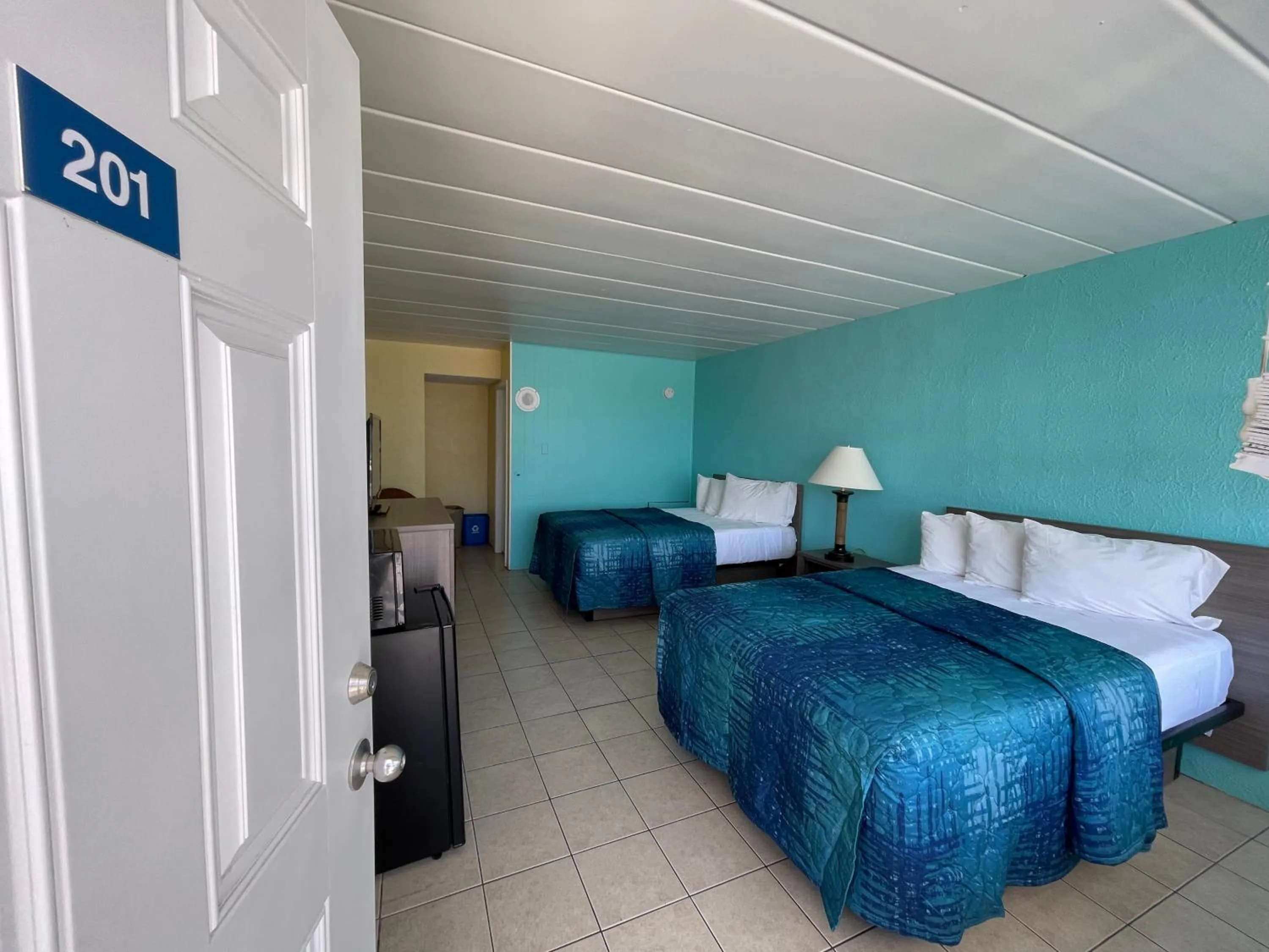 Bed in Bird of Paradise Motel