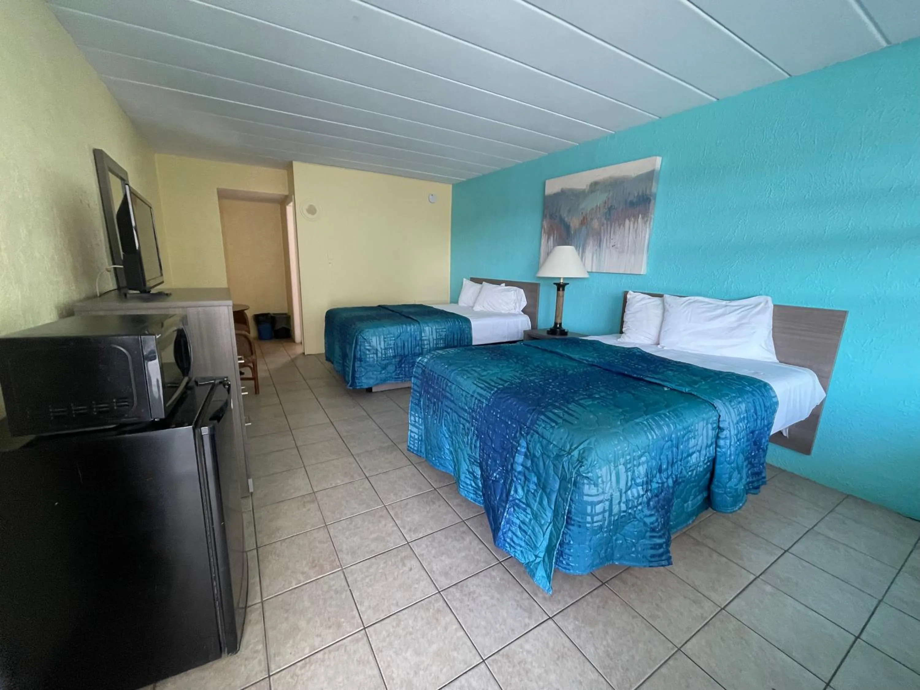 Bed in Bird of Paradise Motel