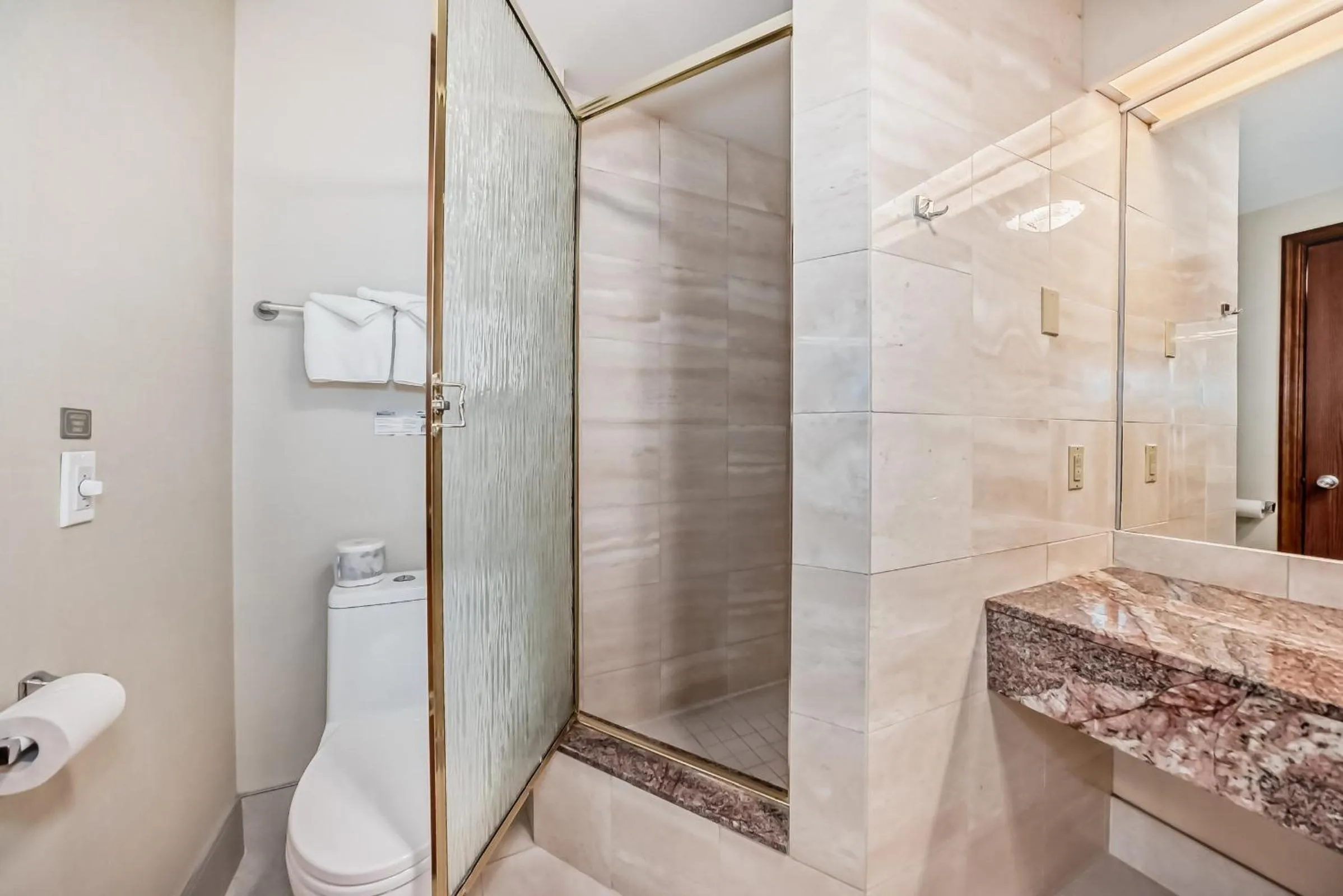 Shower in Jasper Inn & Suites by INNhotels
