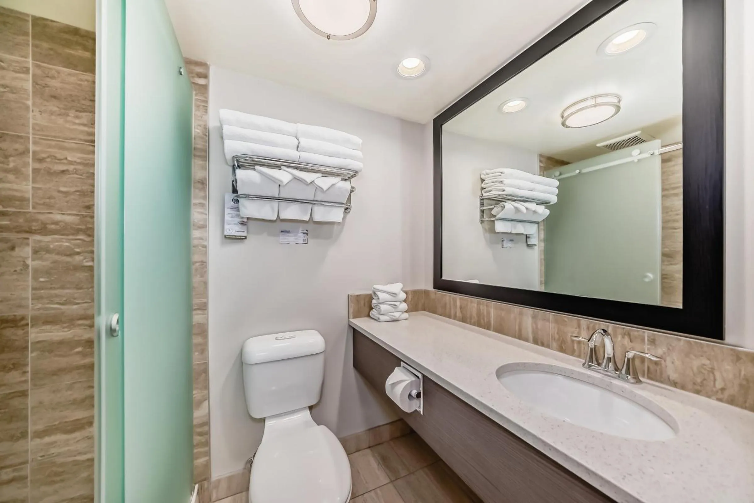 Shower in Jasper Inn & Suites by INNhotels