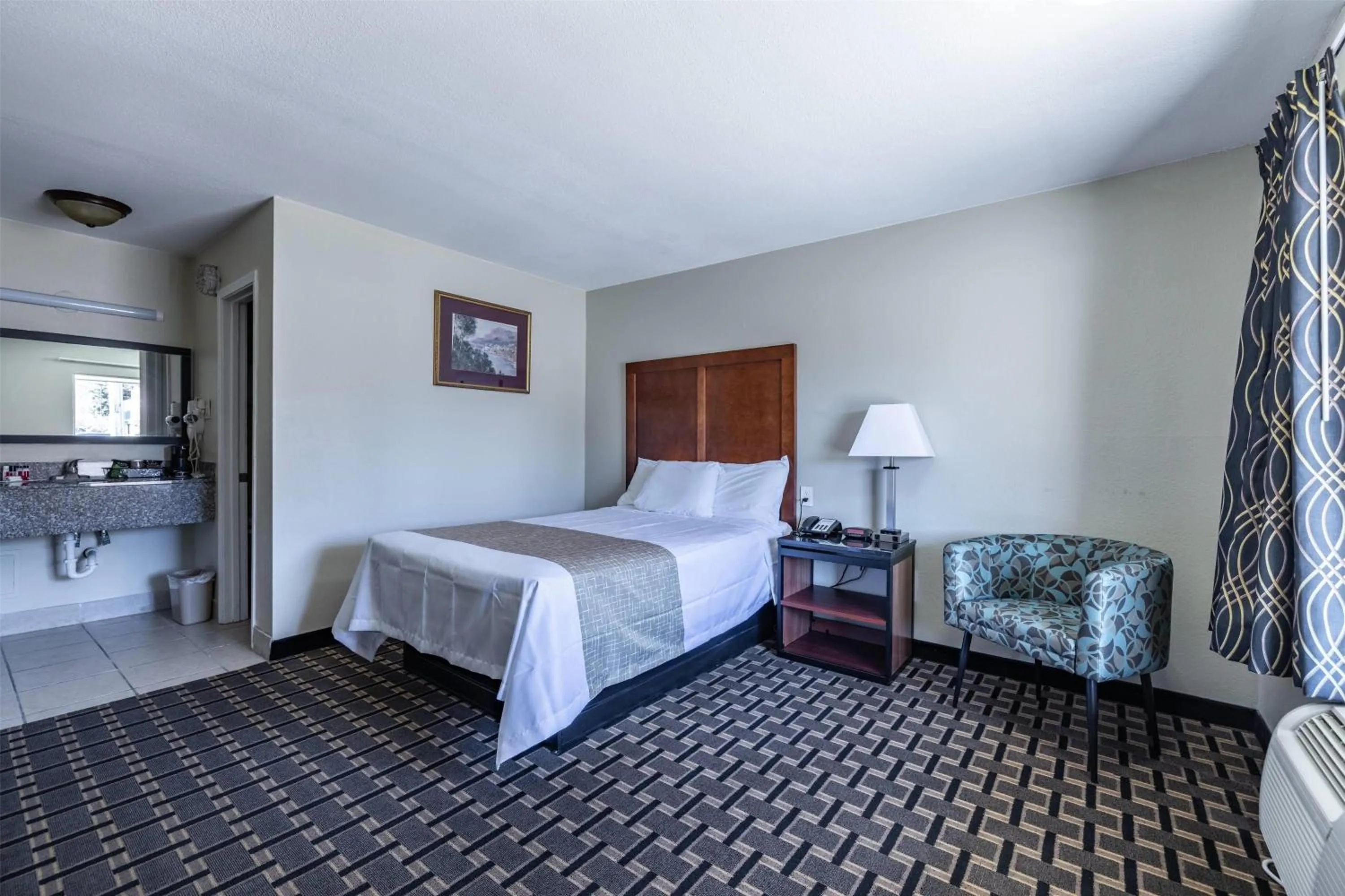 Photo of the whole room, Bed in Travelodge by Wyndham Jackson I-40 Exit 82