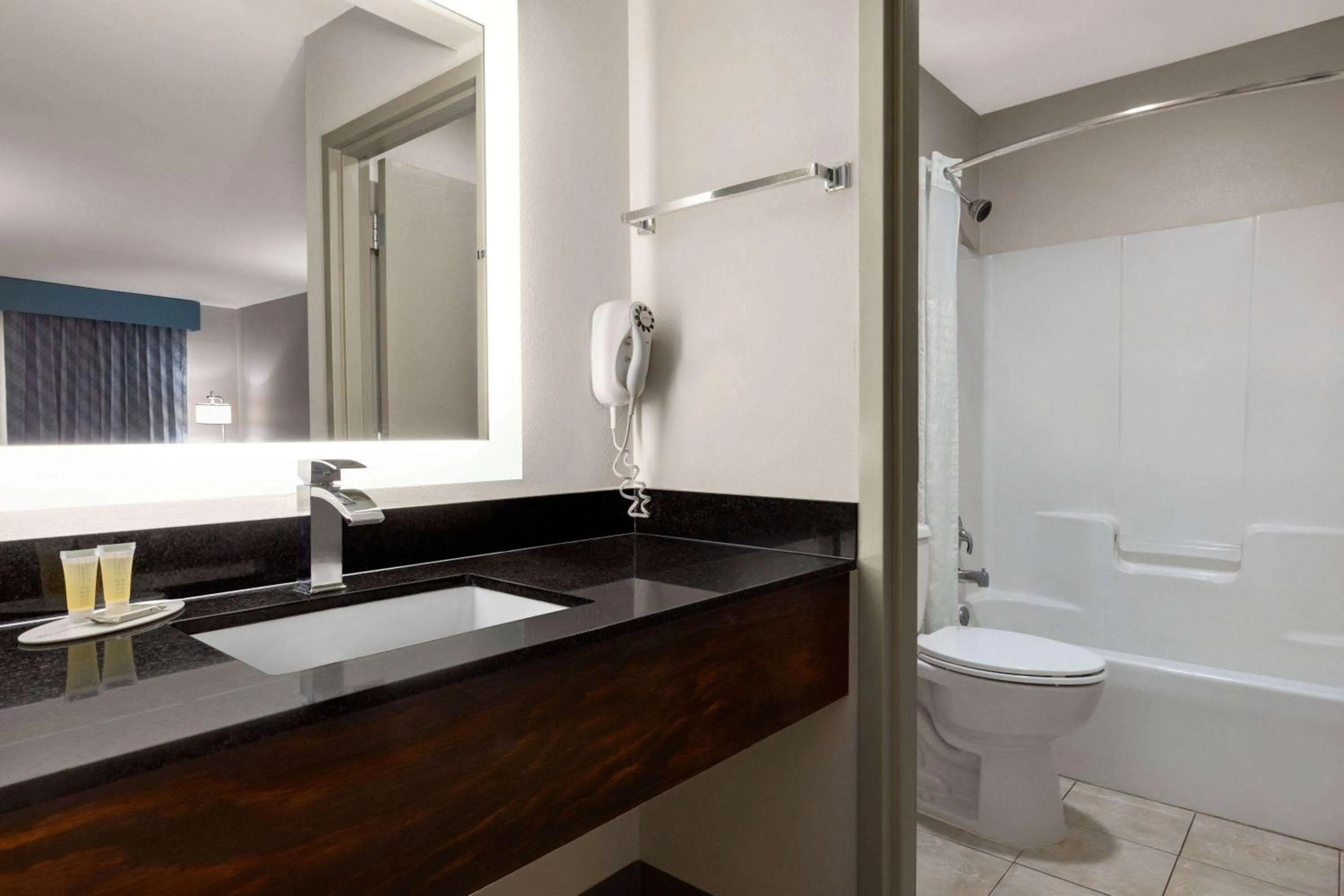 Bathroom in Days Inn by Wyndham Covington