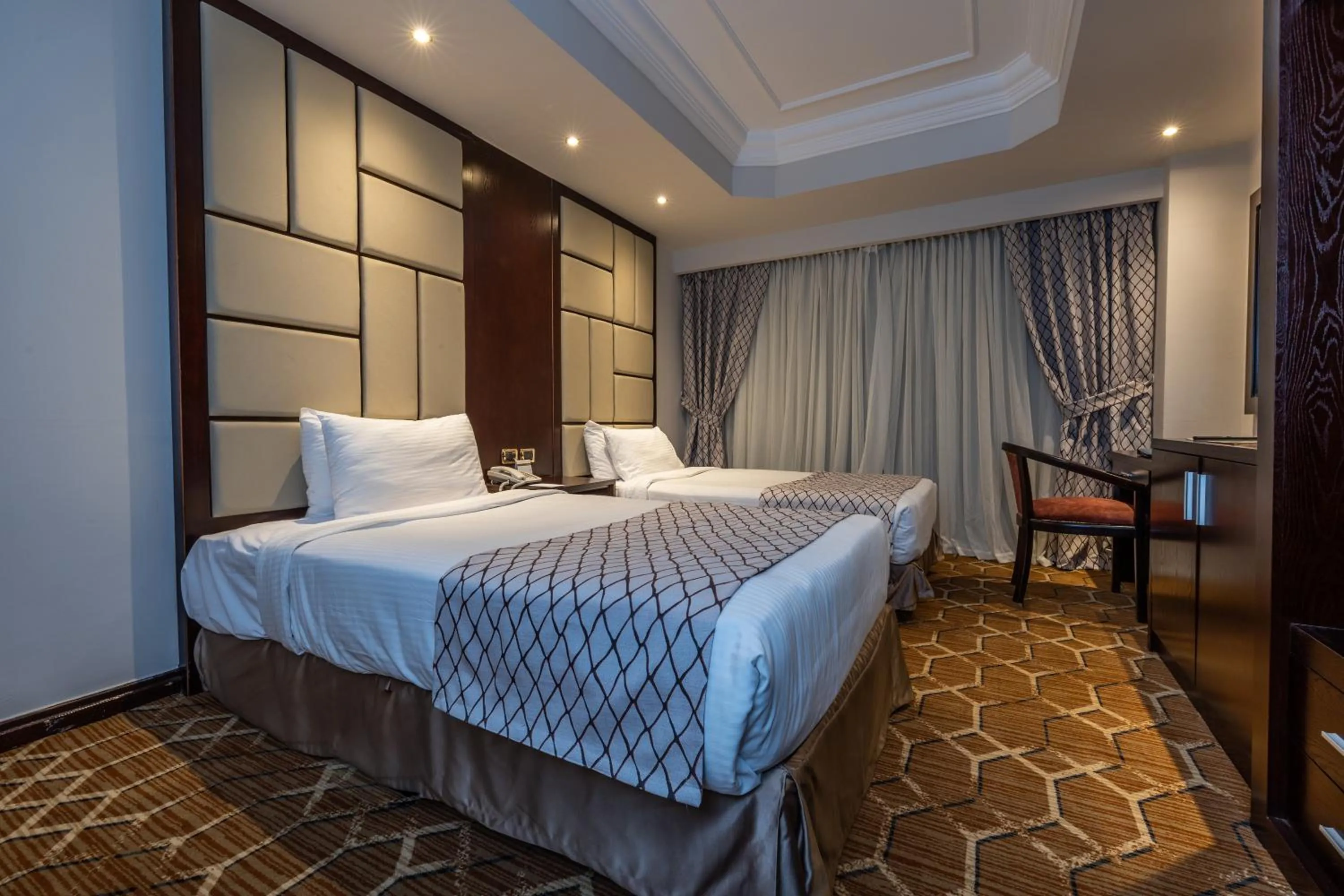 Bedroom, Bed in Triumph Plaza Hotel