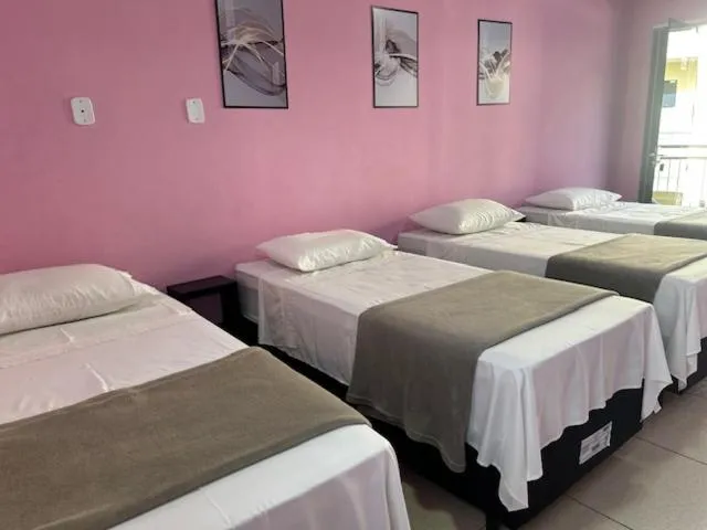 Bed in Pousada Mercosul