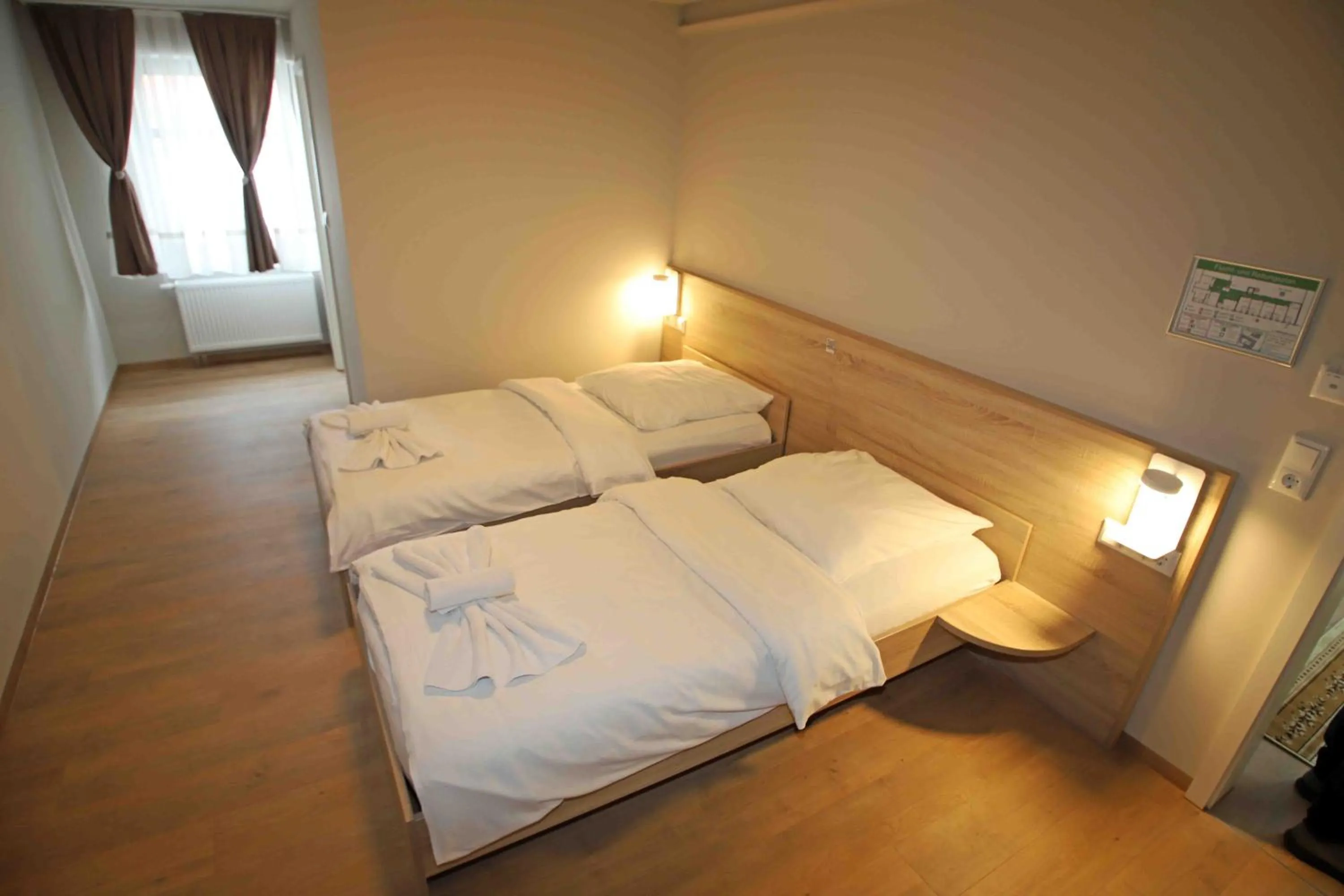 Bed in Pension Villa Colosseo im Herzen von Meiningen