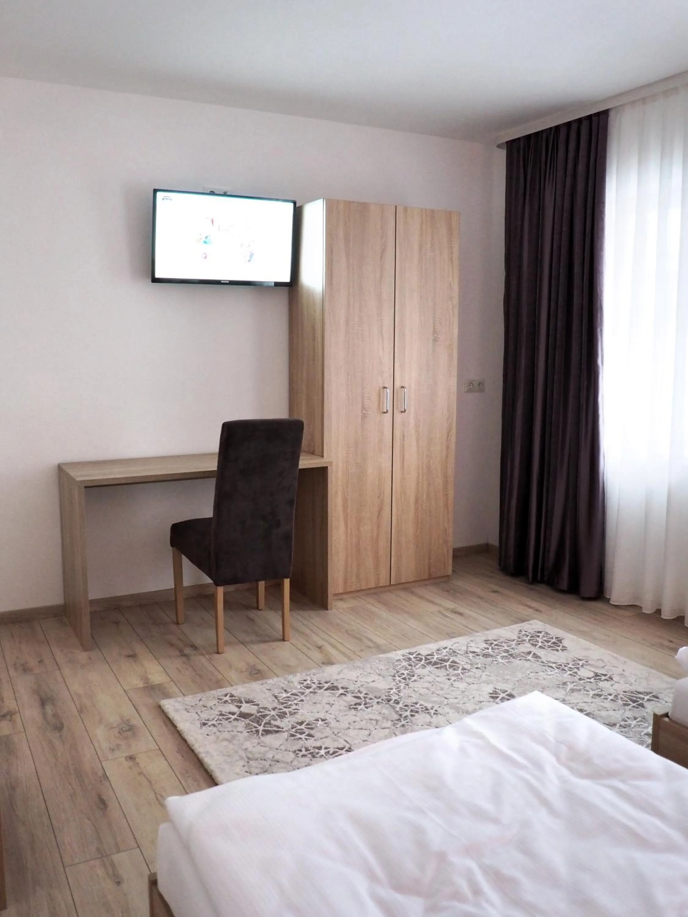 Bed in Pension Villa Colosseo im Herzen von Meiningen