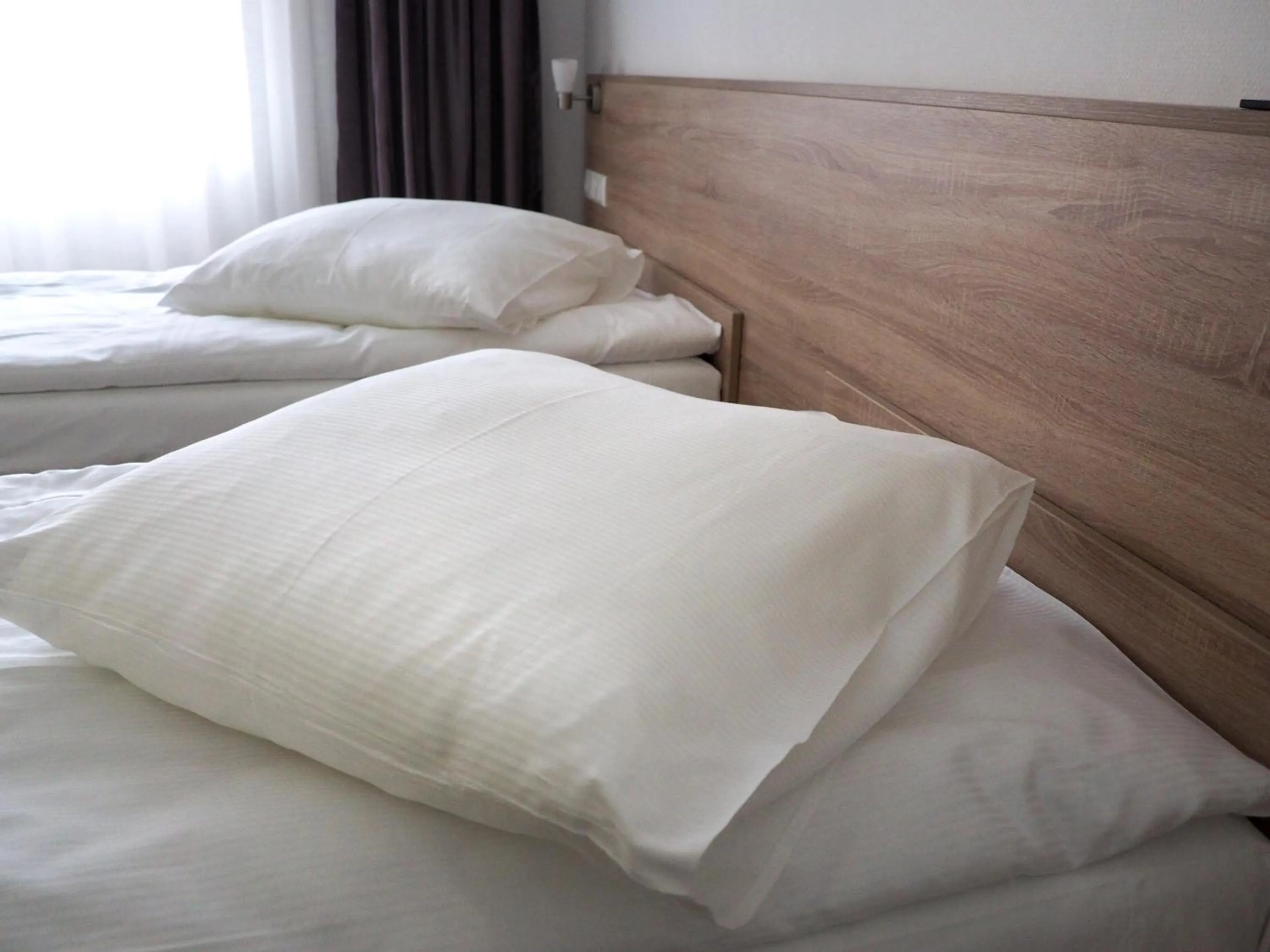 Bed in Pension Villa Colosseo im Herzen von Meiningen