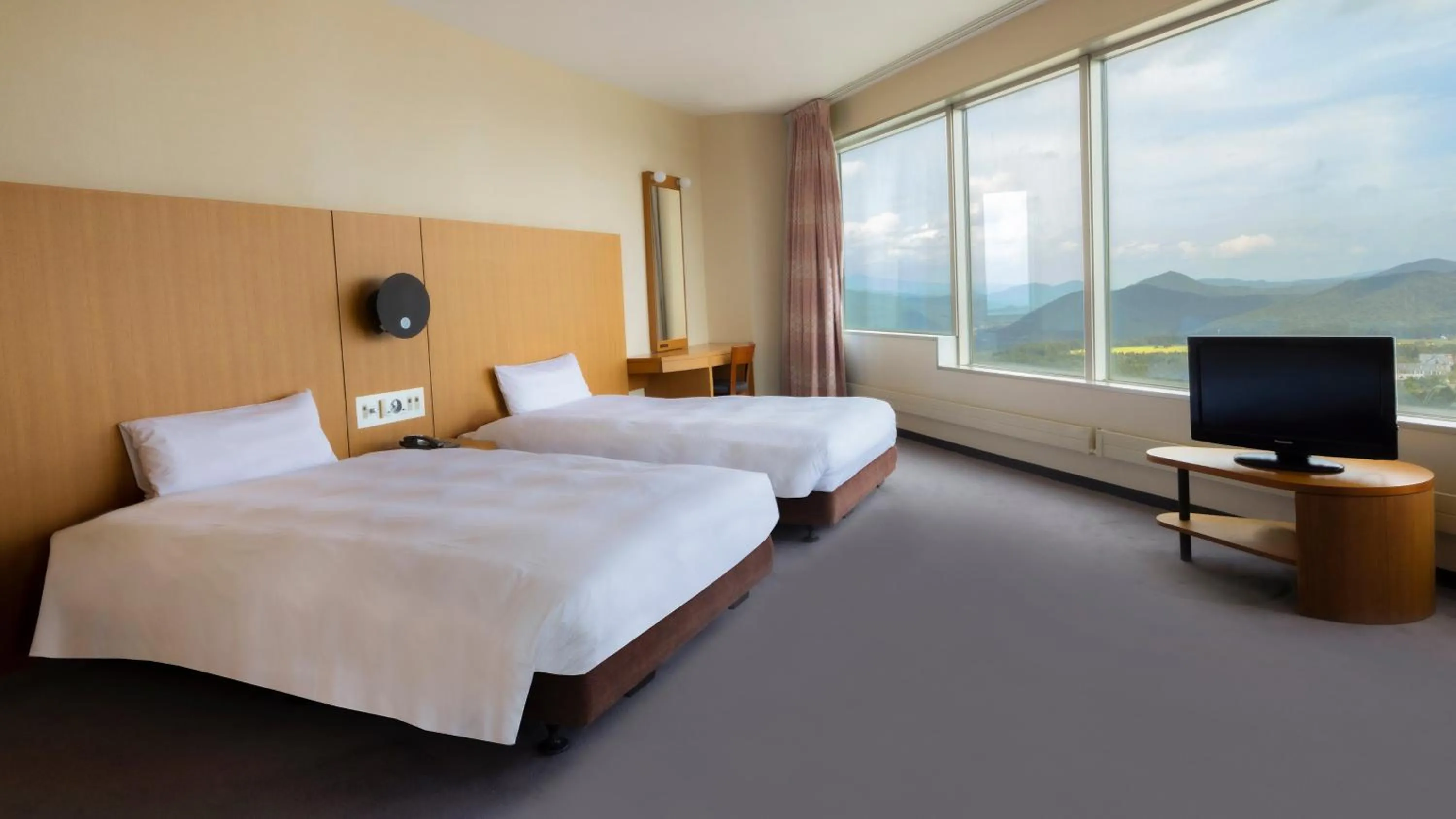 Photo of the whole room, Bed in ANA Crowne Plaza Resort Appi Kogen by IHG