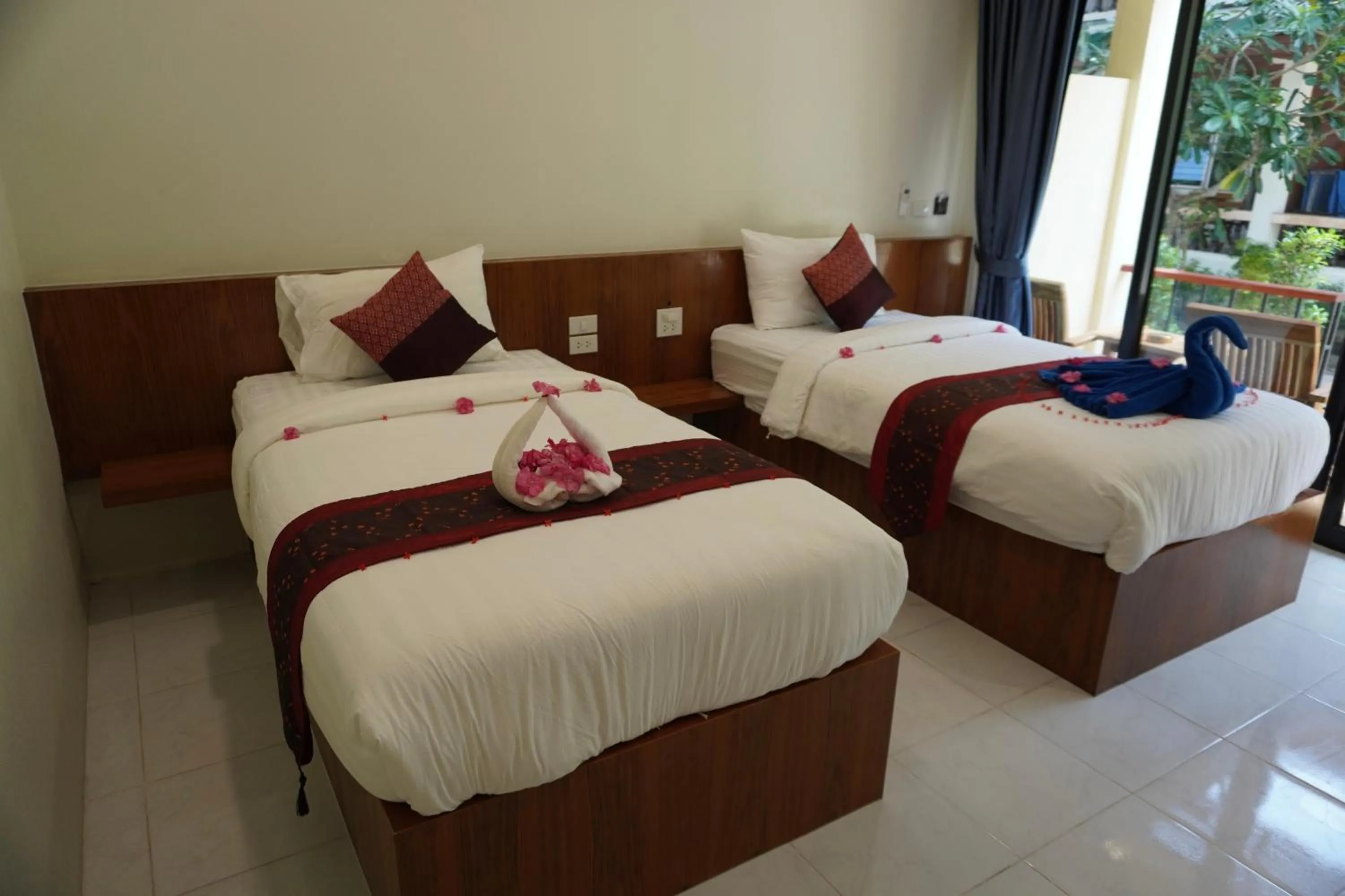 Bed in JP Resort Koh Tao