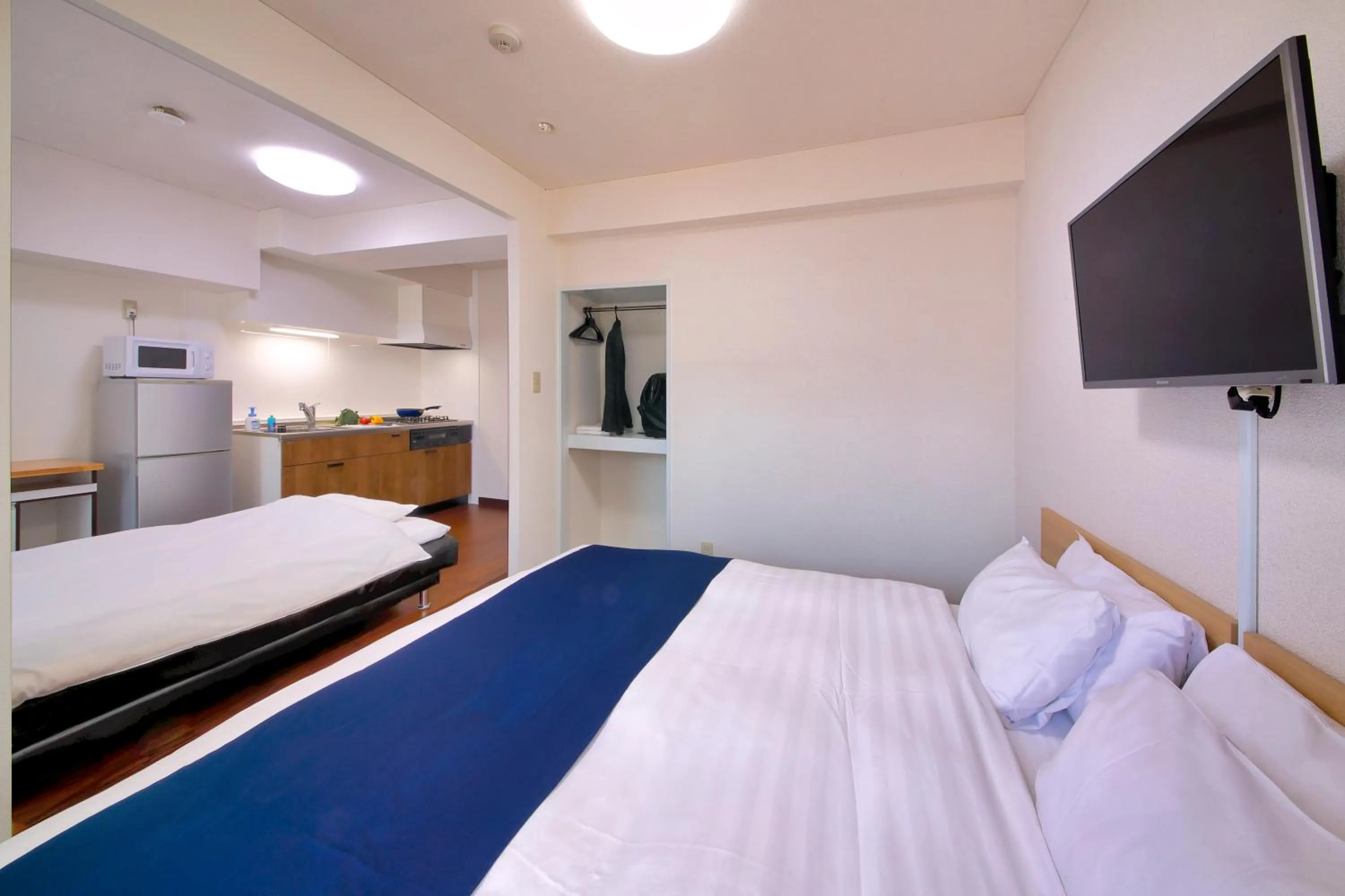 Photo of the whole room, Bed in HOTEL Nishikawaguchi Weekly