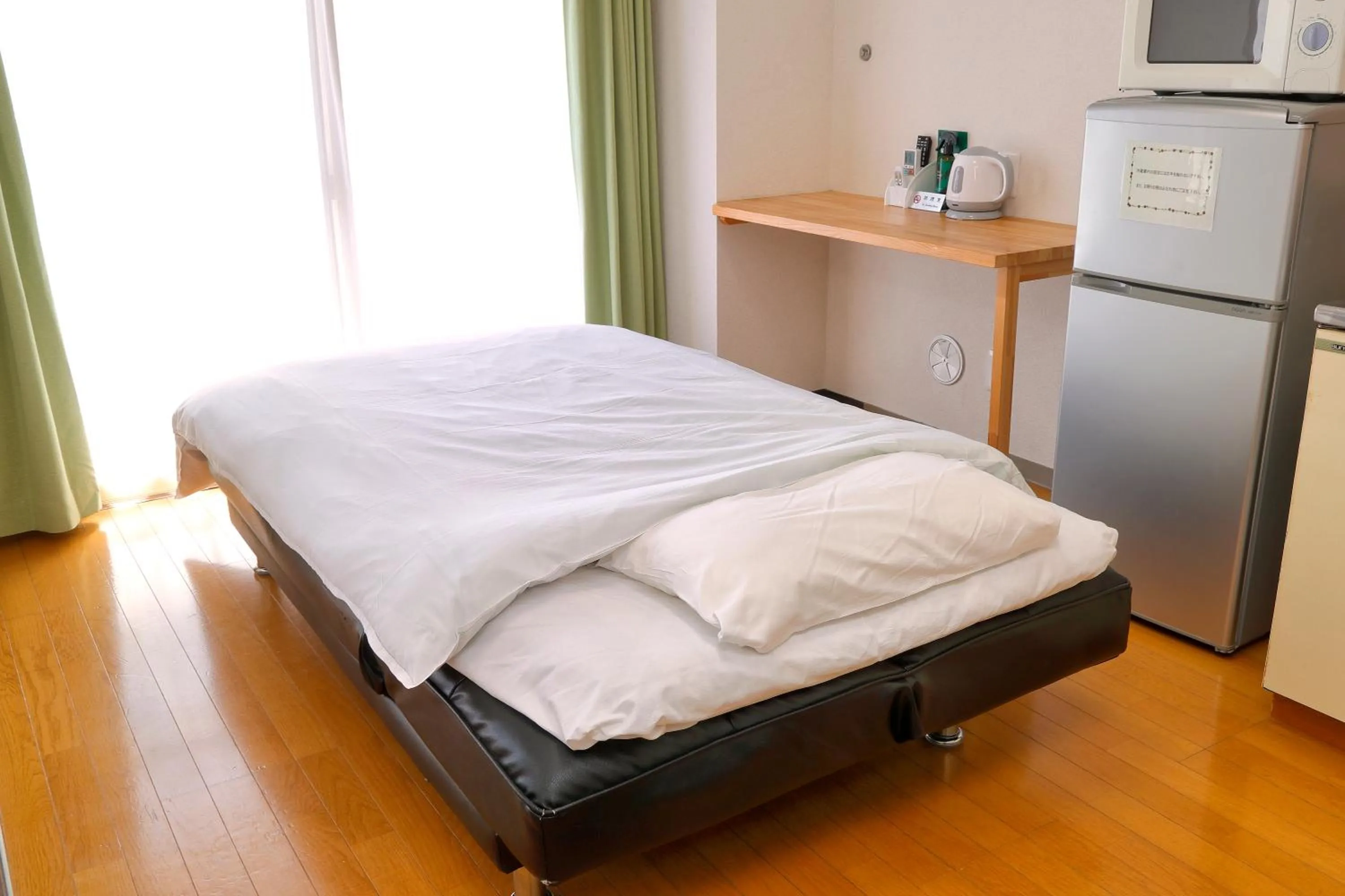 Bed in HOTEL Nishikawaguchi Weekly