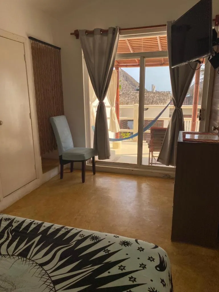 Bed in Casa de las Olas Surf & Beach Club