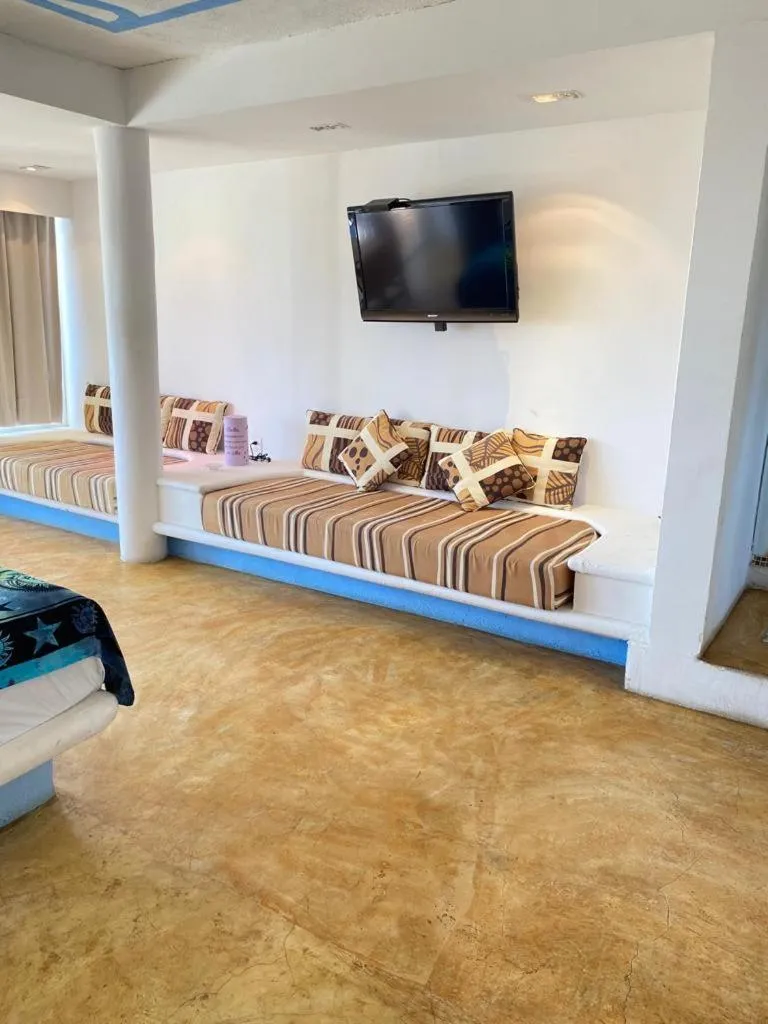 Bed in Casa de las Olas Surf & Beach Club
