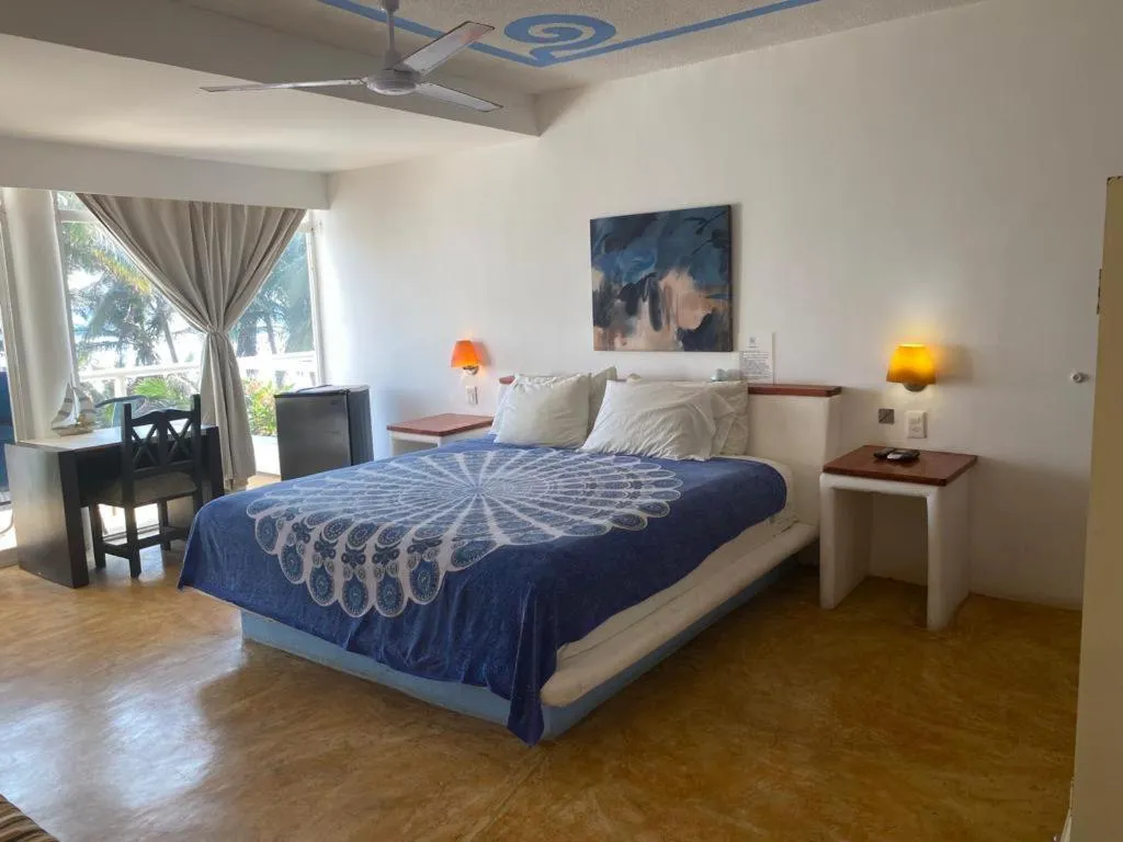 Bed in Casa de las Olas Surf & Beach Club