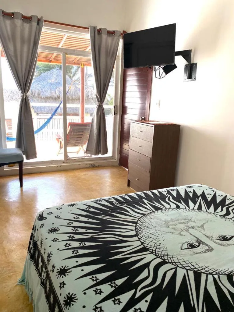 Bed in Casa de las Olas Surf & Beach Club
