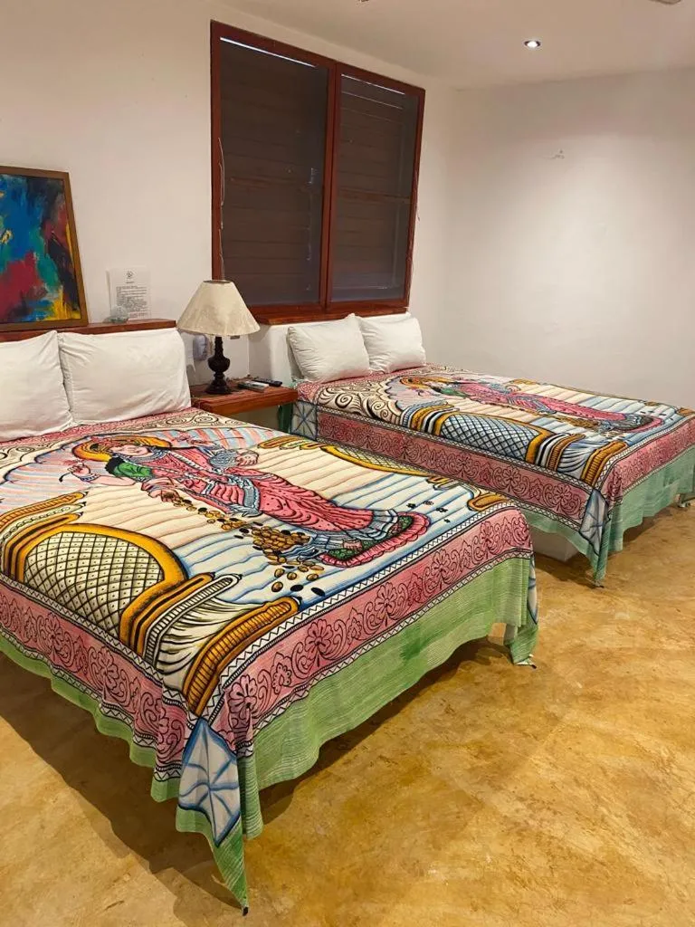 Bed in Casa de las Olas Surf & Beach Club