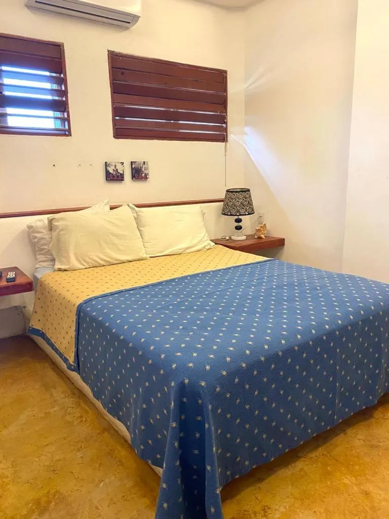 Bed in Casa de las Olas Surf & Beach Club