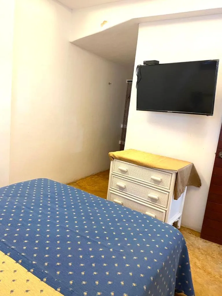 Bed in Casa de las Olas Surf & Beach Club