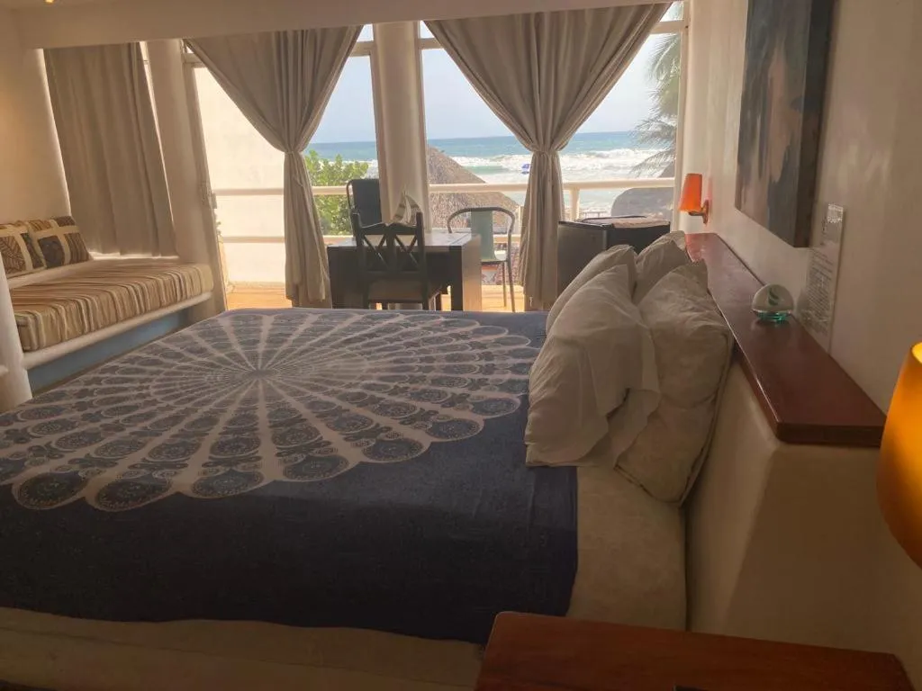 Bed in Casa de las Olas Surf & Beach Club