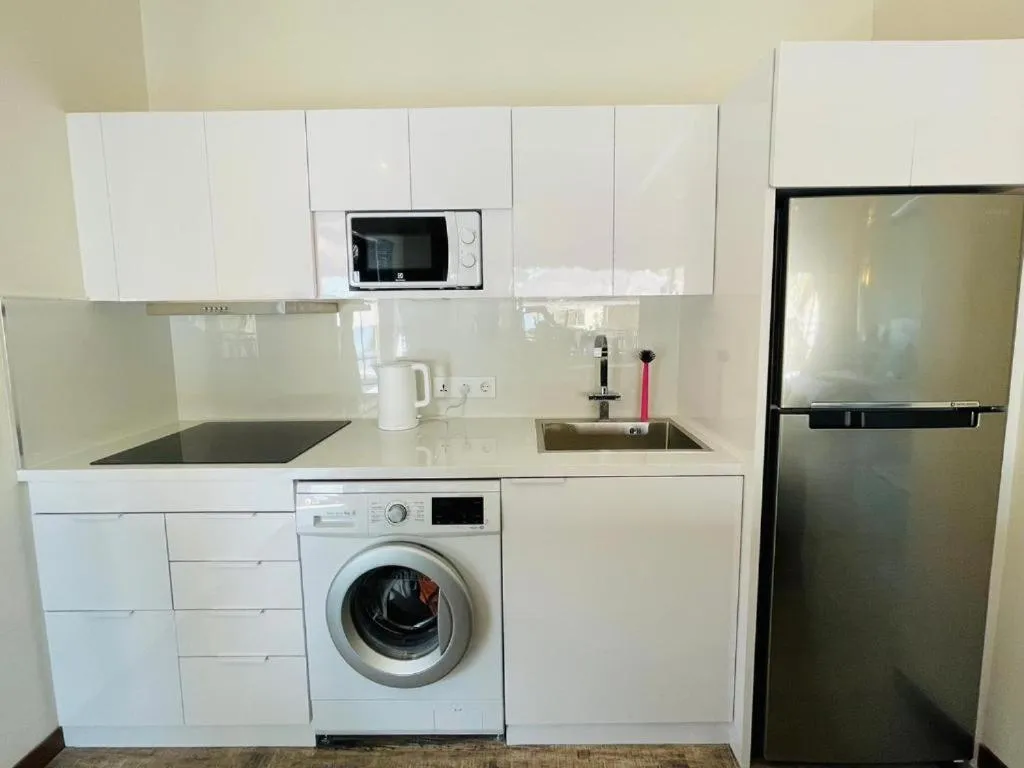 Kitchen or kitchenette in Absolute Beachfront Resort