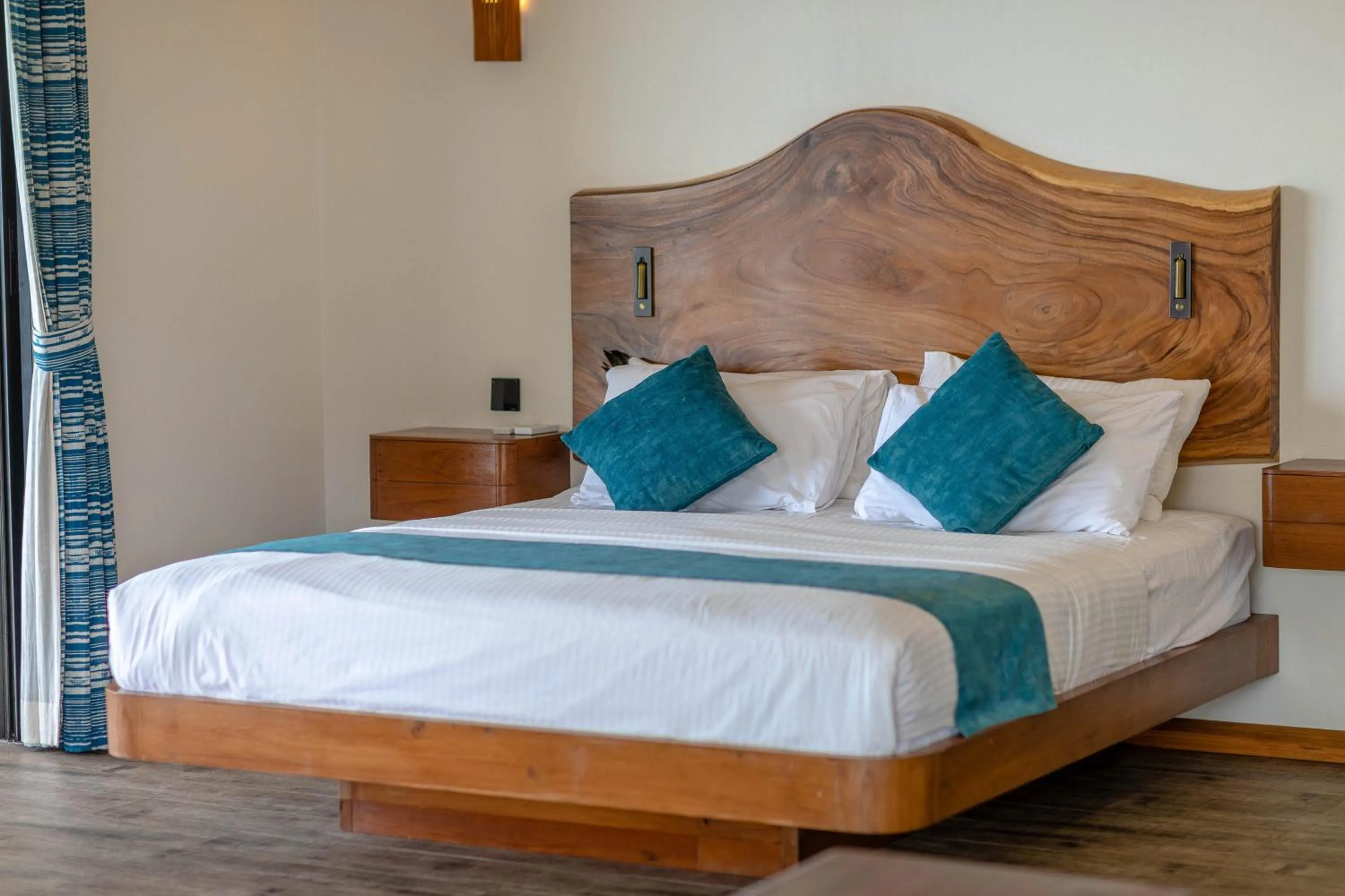 Bed in Absolute Beachfront Resort