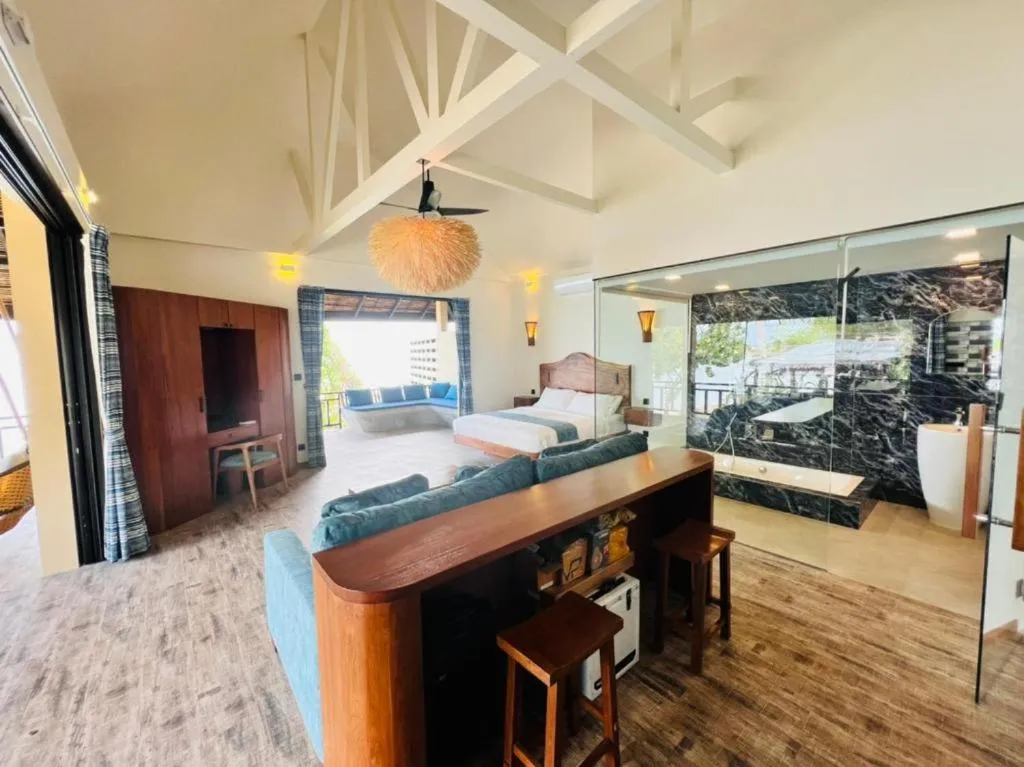 Photo of the whole room, Bed in Absolute Beachfront Resort