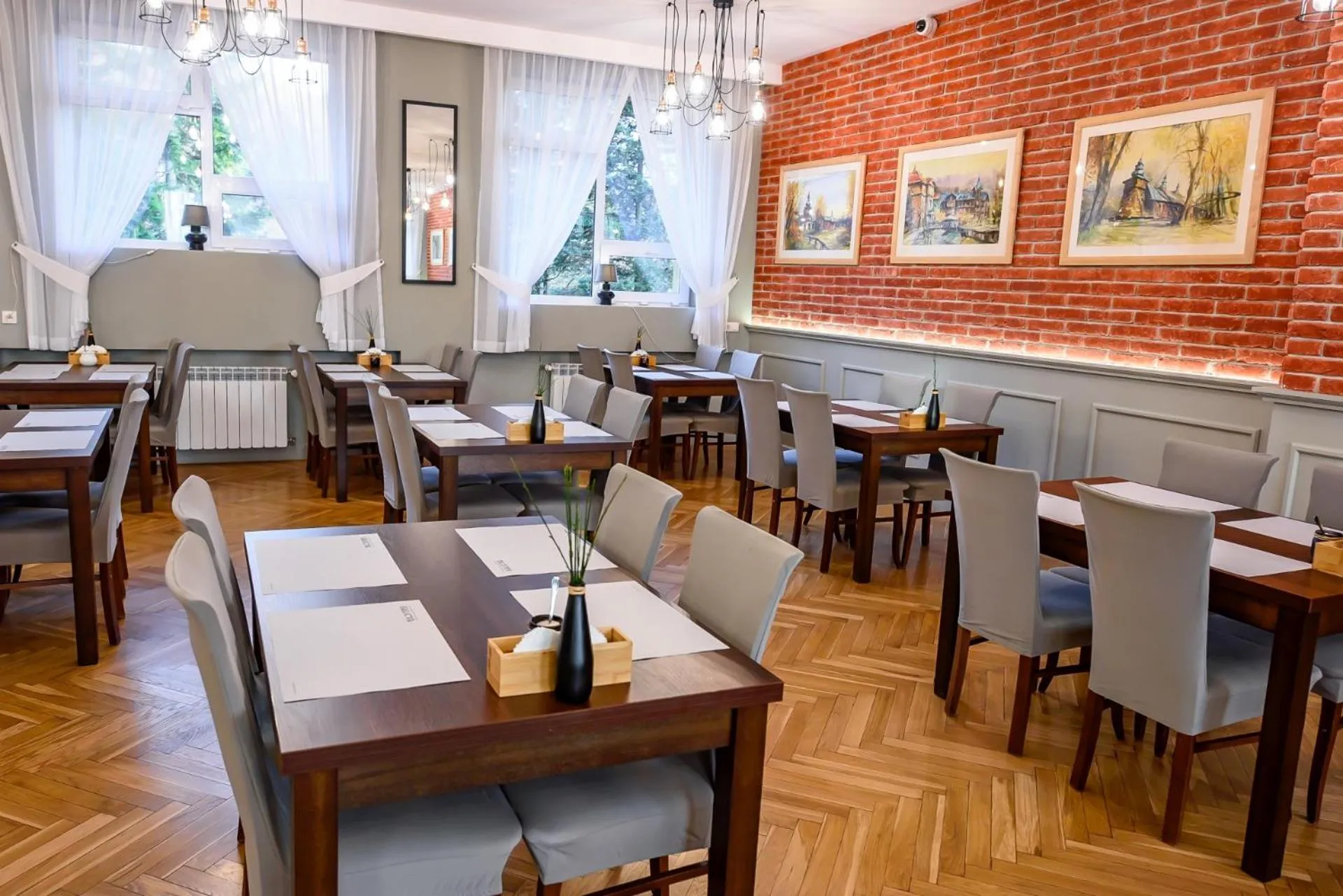 Dining area in Ośrodek Szkoleniowo Wypoczynkowy Galicya