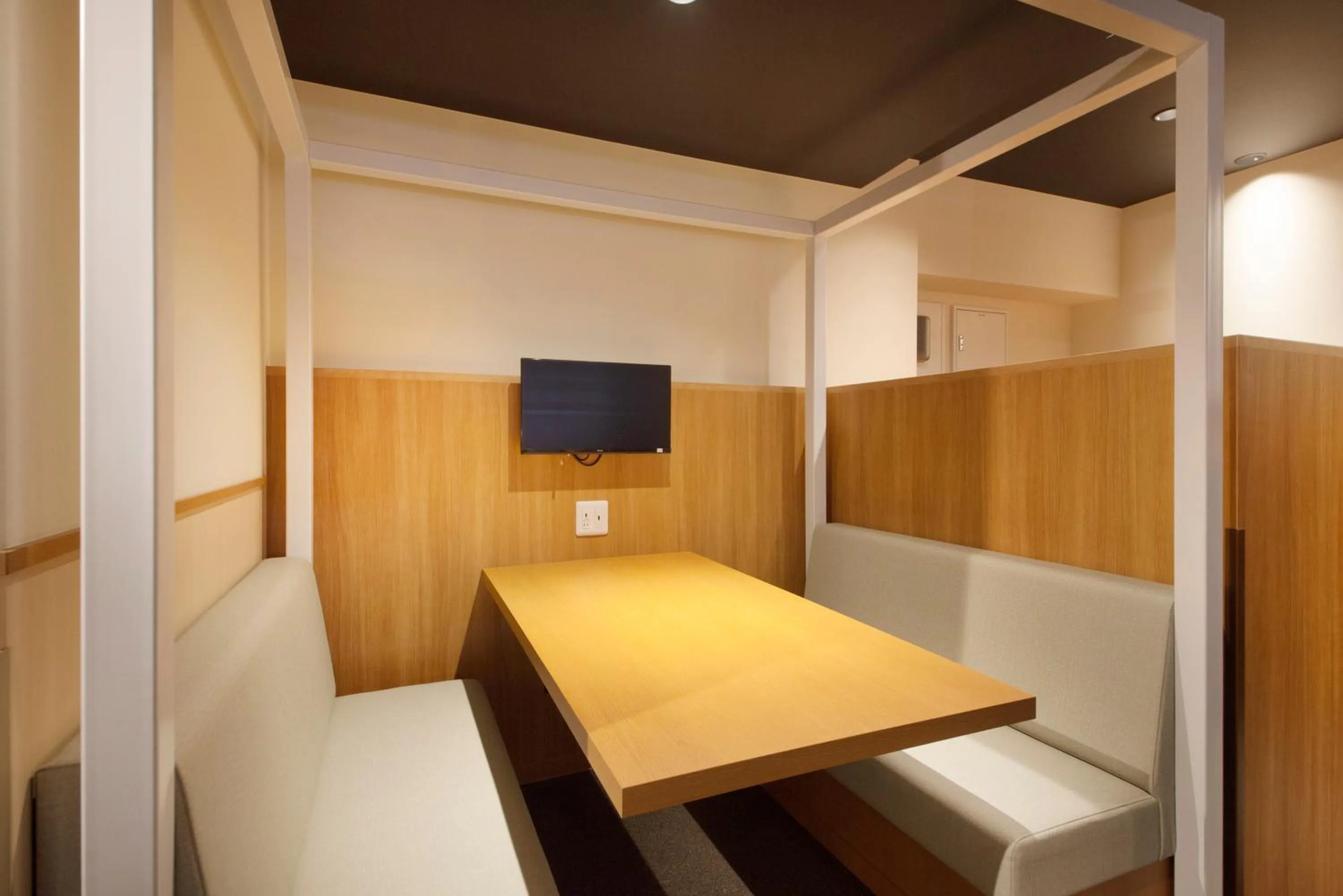 Communal lounge/ TV room in Tabist CapsuleHotel APODS Himeji Station