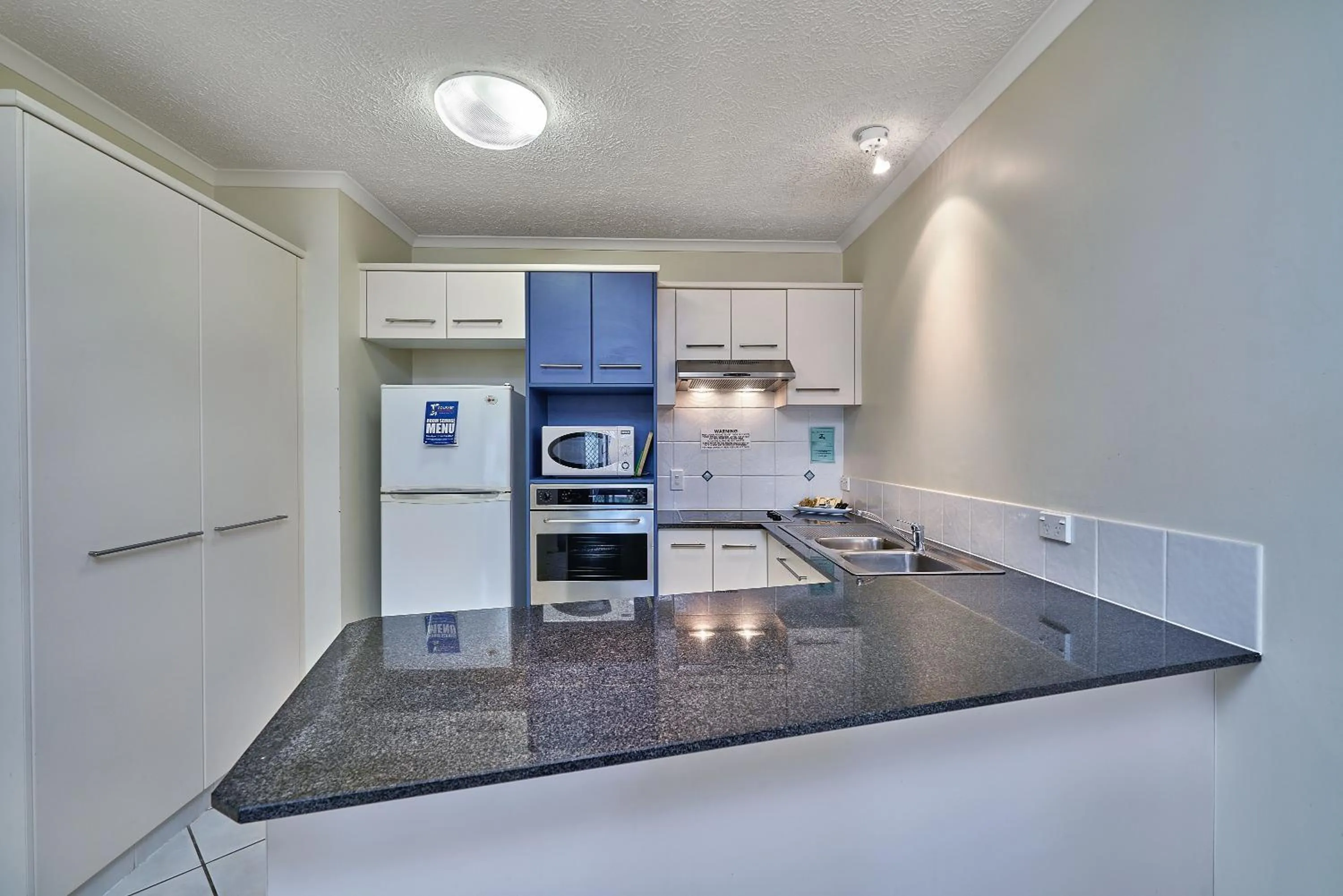Kitchen or kitchenette in North Cove Waterfront Suites