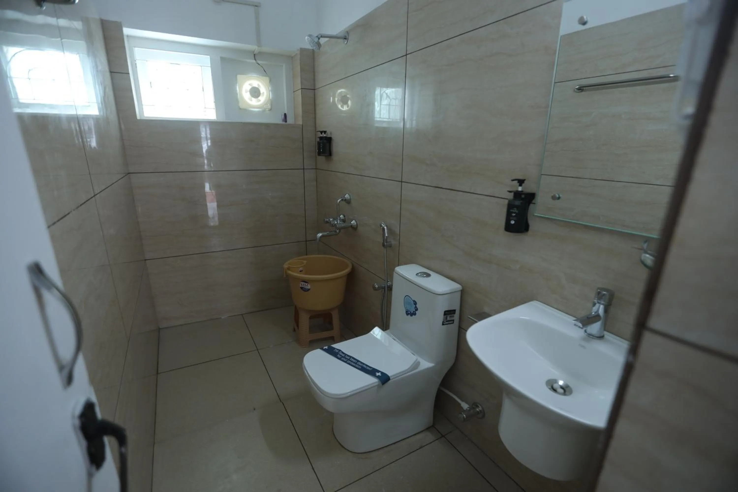 Toilet in Delightz Inn