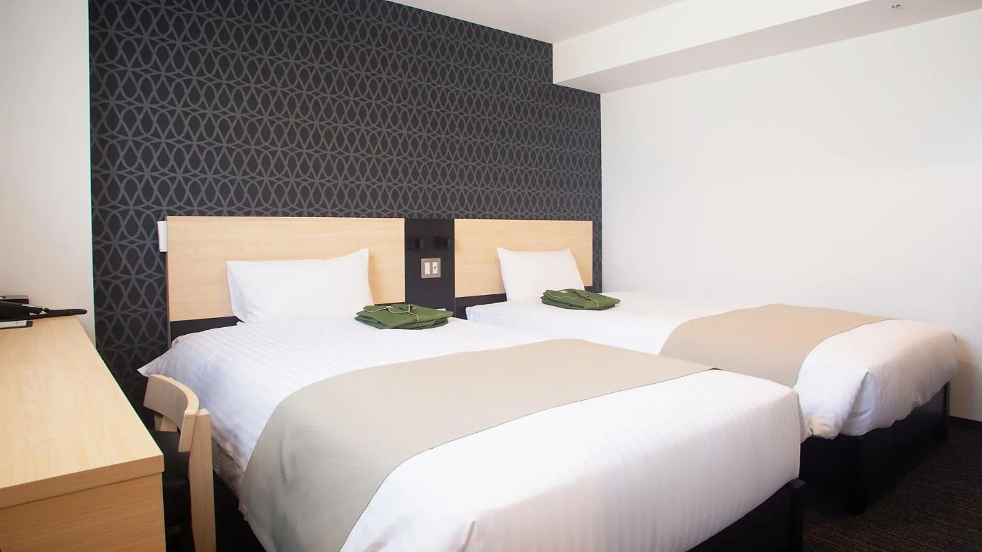 Bed in Hotel Kuretakeso Hiroshima Otemachi