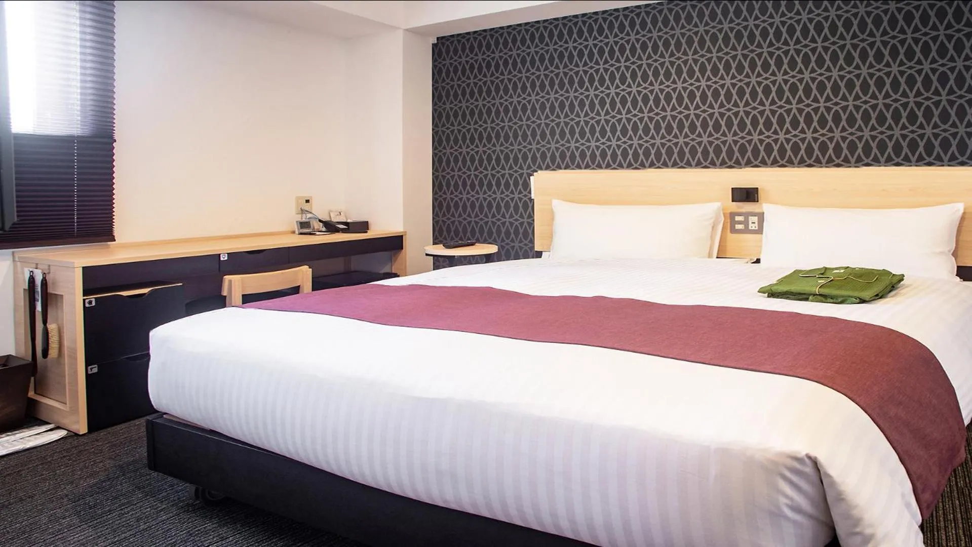 Bed in Hotel Kuretakeso Hiroshima Otemachi