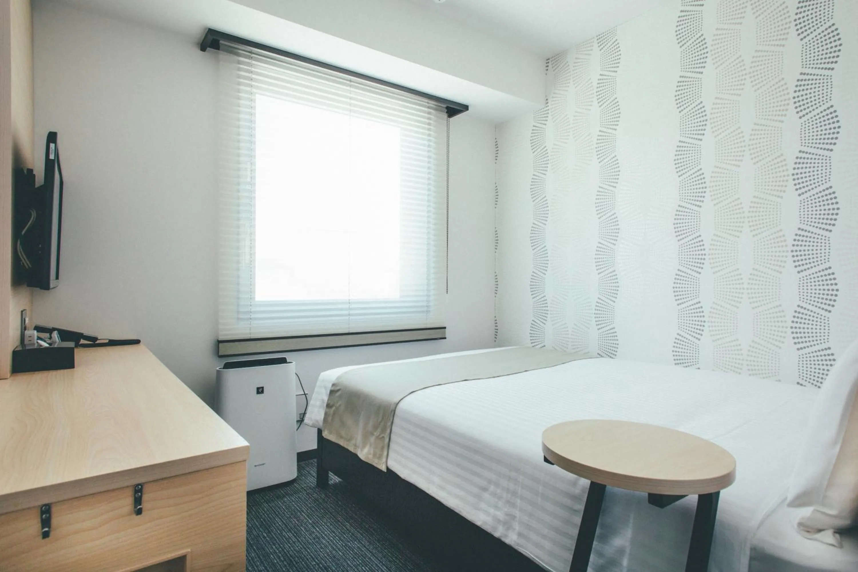 Bed in Hotel Kuretakeso Hiroshima Otemachi