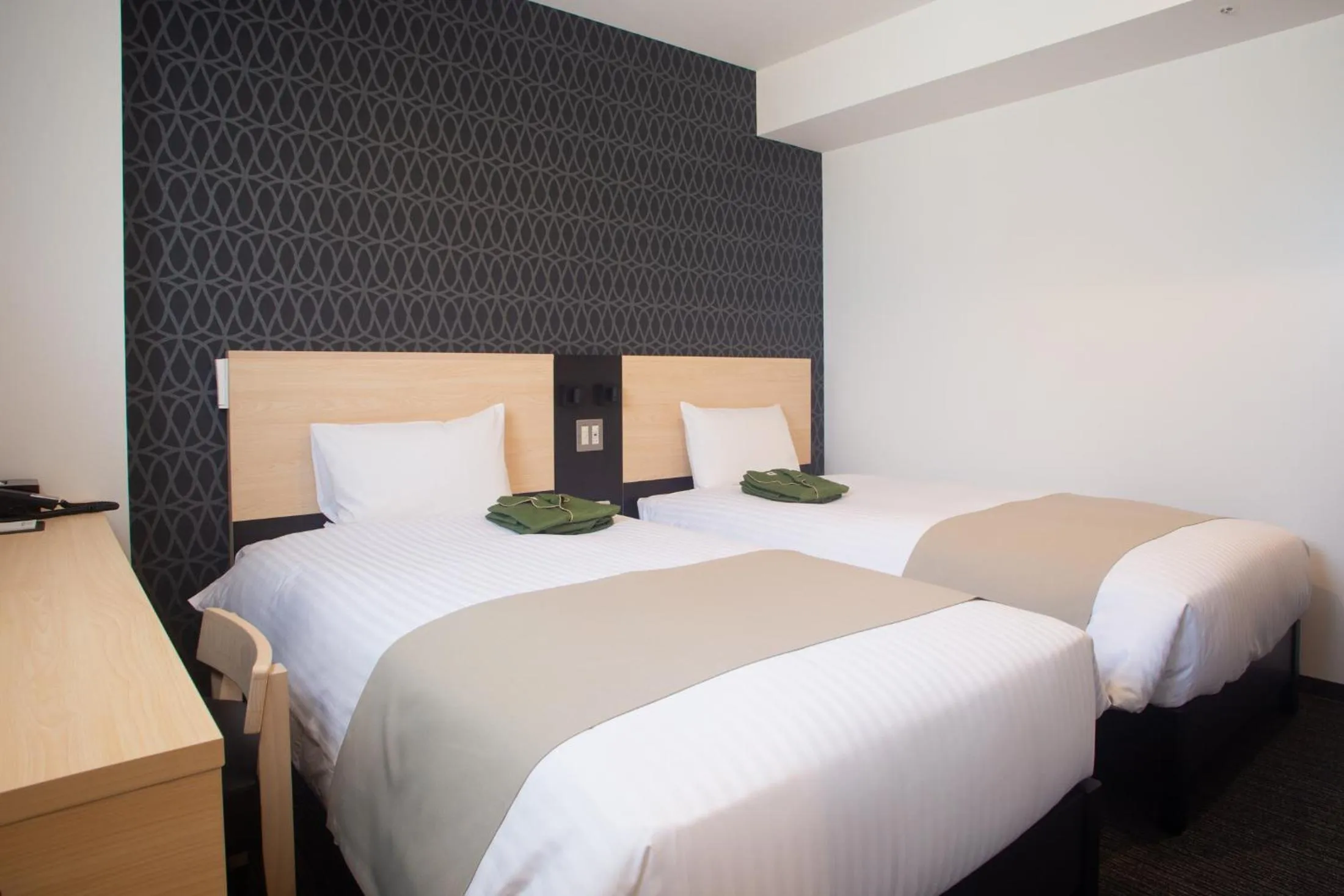 Bed in Hotel Kuretakeso Hiroshima Otemachi