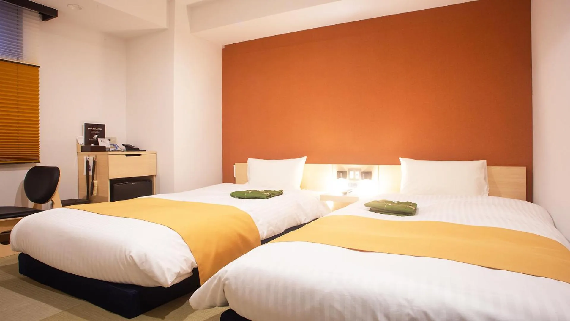 Bed in Hotel Kuretakeso Hiroshima Otemachi