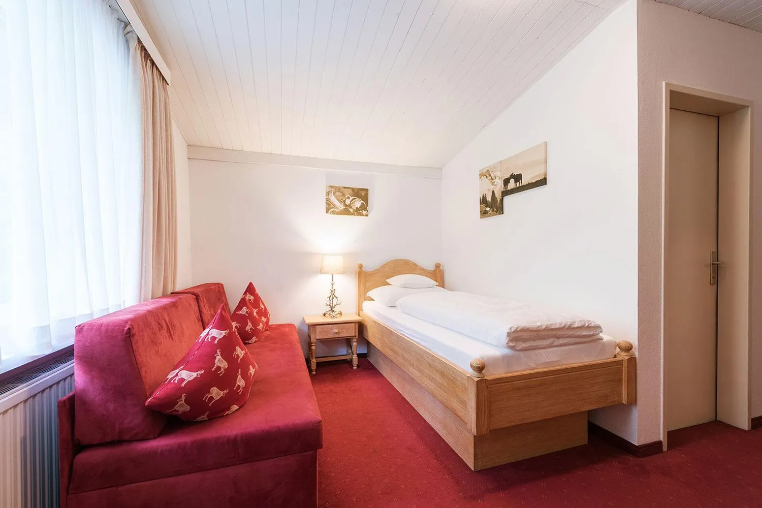 Bed in Hotel Pettneuerhof