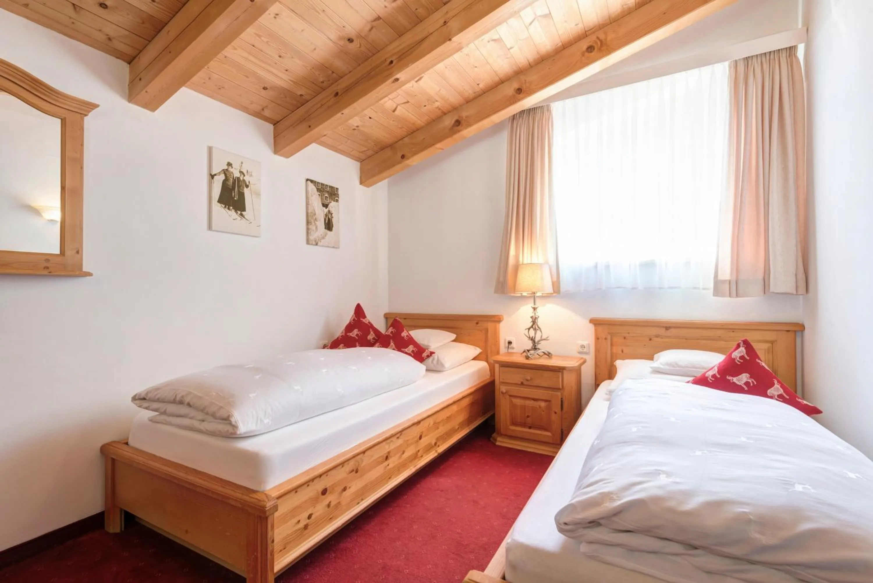 Bed in Hotel Pettneuerhof