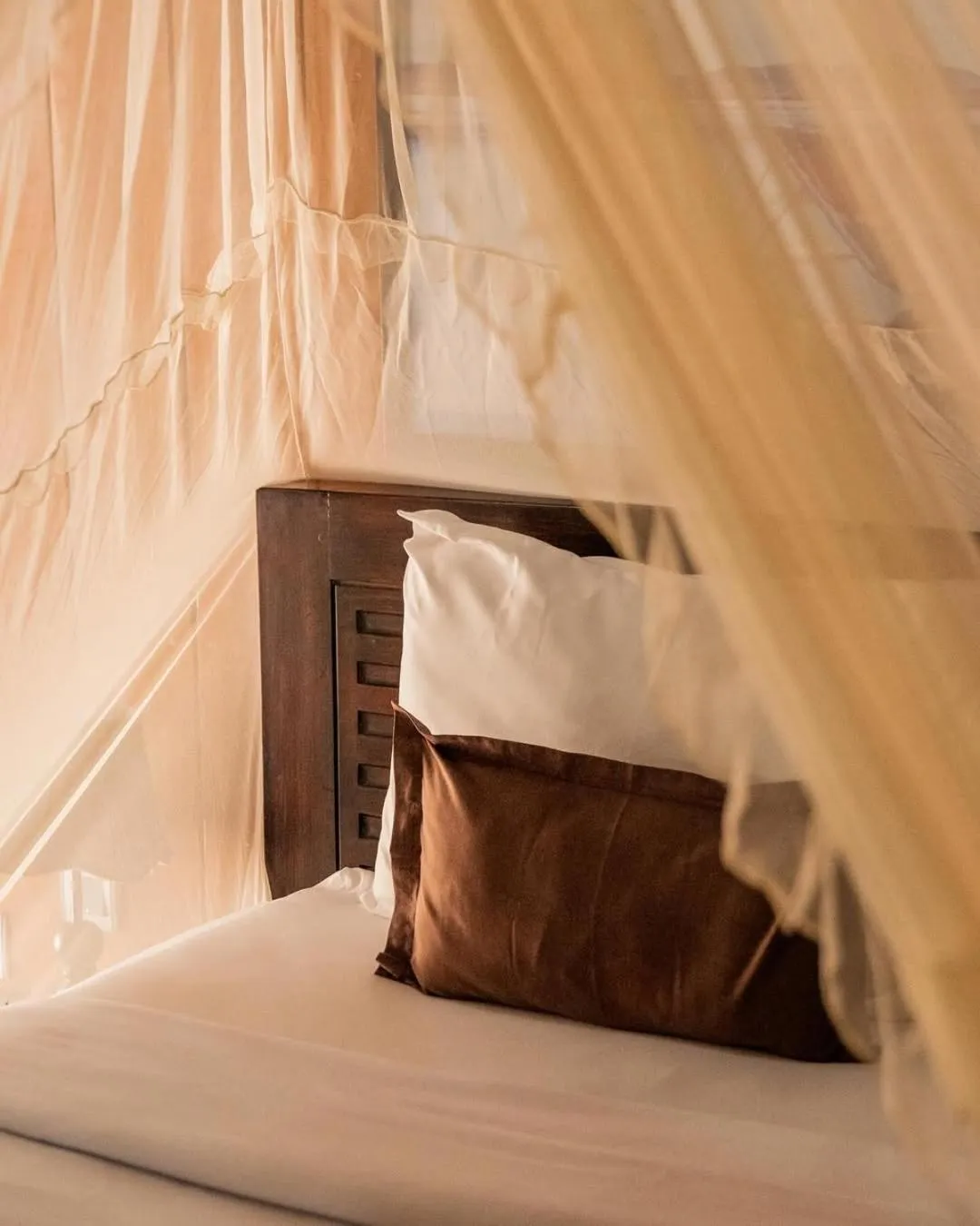 Property building, Bed in Yoki's Bungalows