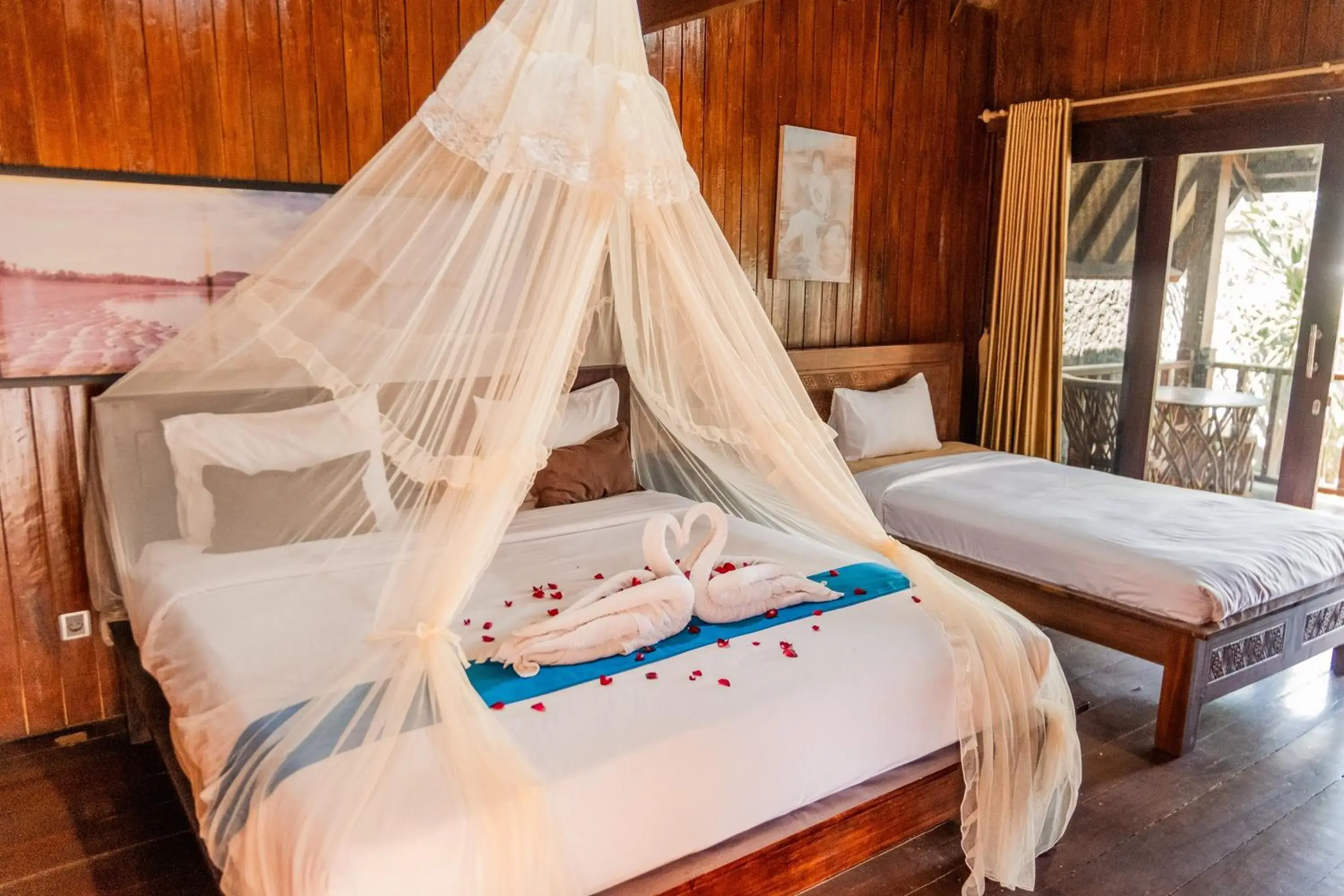 Bed in Yoki's Bungalows Bed in Yoki's Bungalows