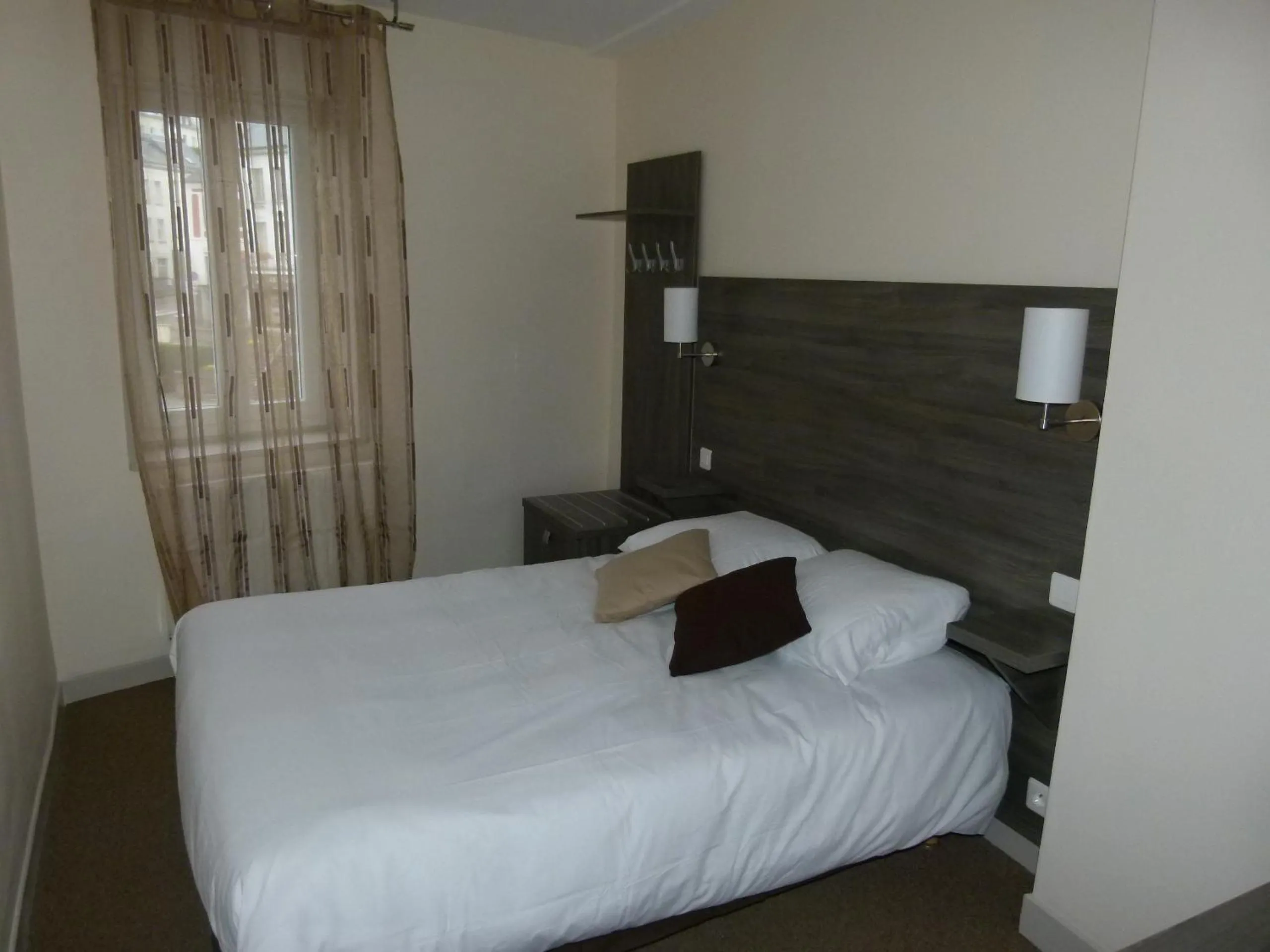 Photo of the whole room, Bed in Logis-Hôtel & Restaurant LE CARNOT