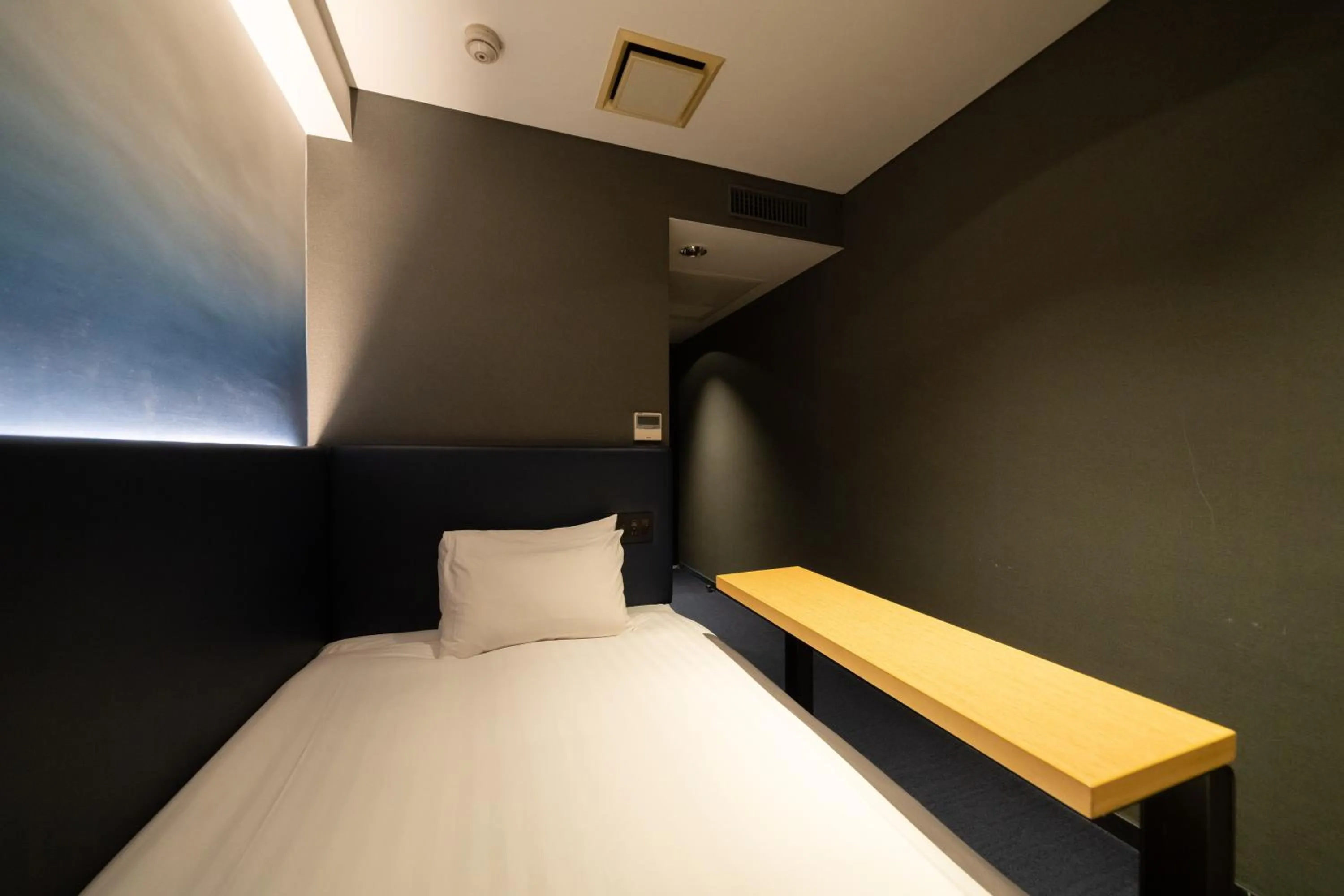 Bed in Hotel New Shohei