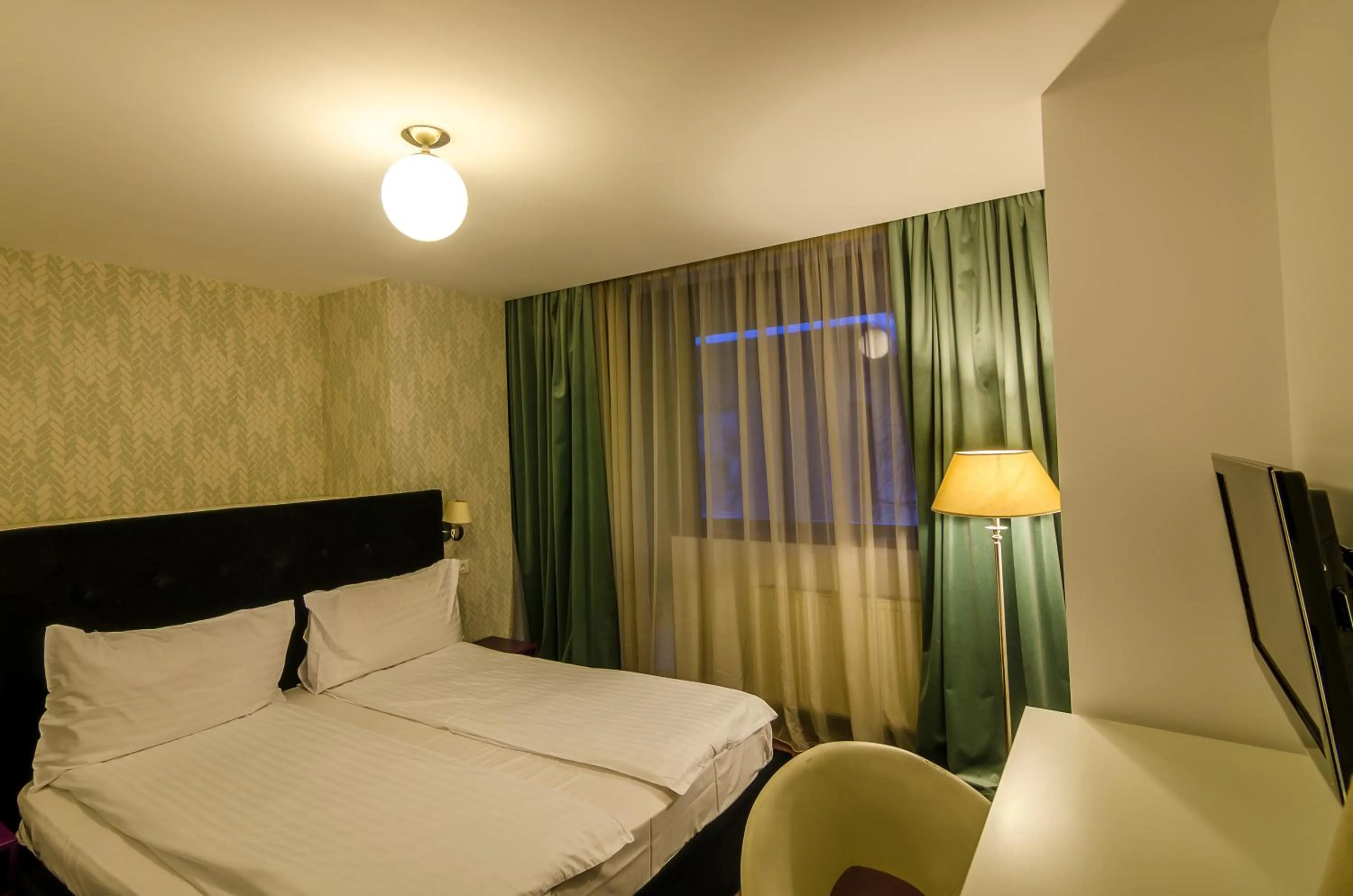 Bed in Apart Hotel Vlad Tepes