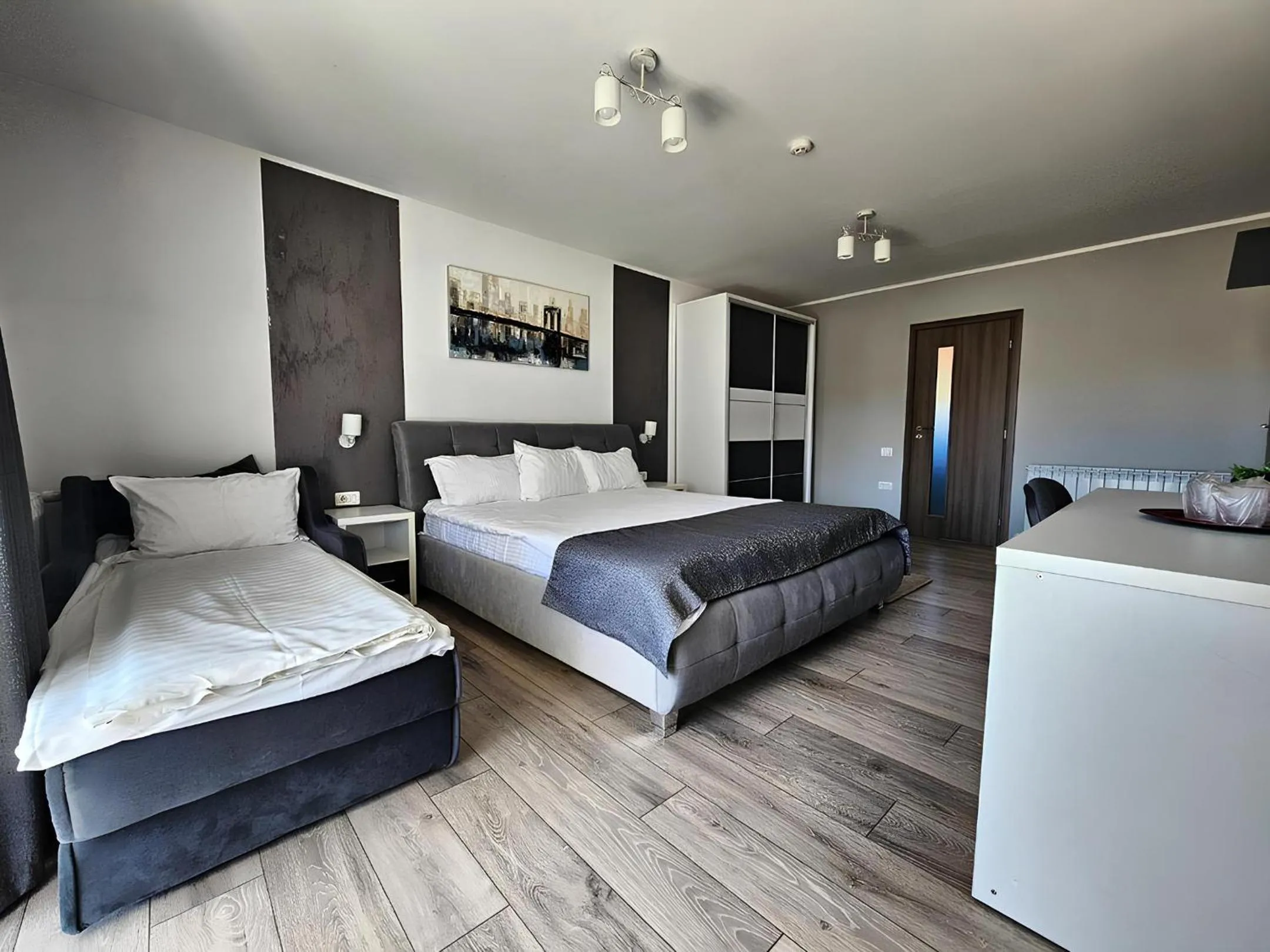 Bed in Pensiunea Andrei Moieciu