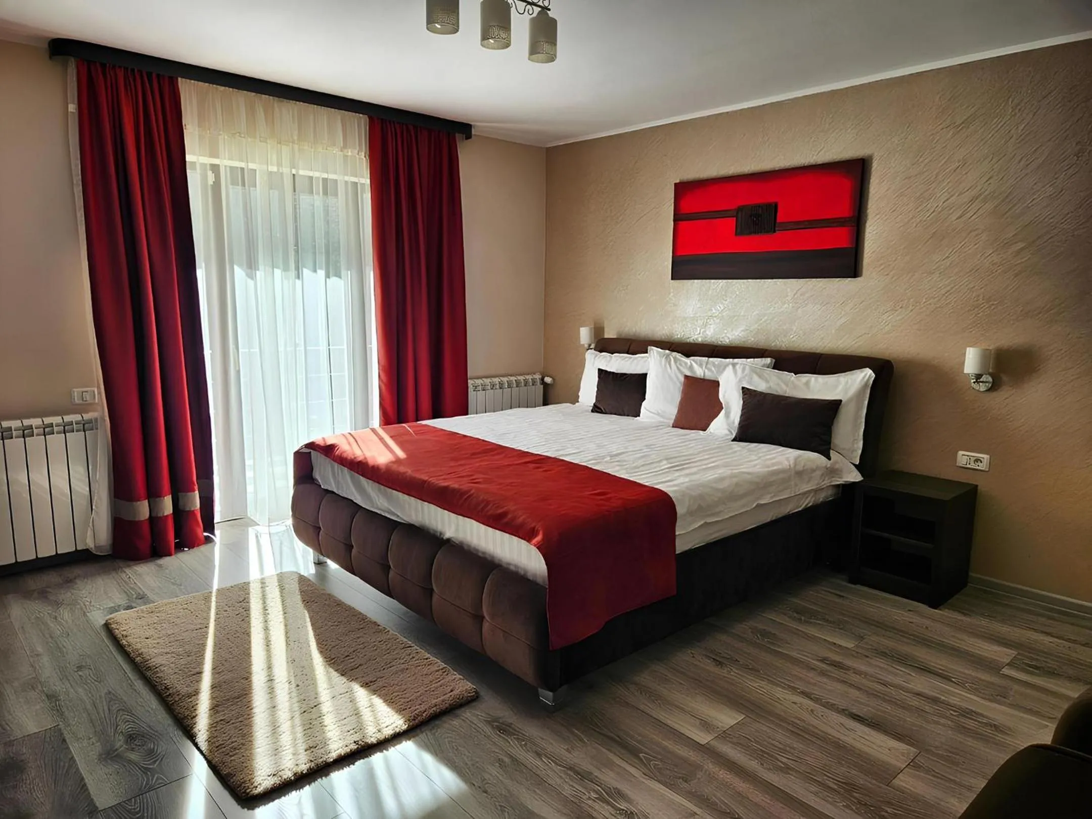Bed in Pensiunea Andrei Moieciu